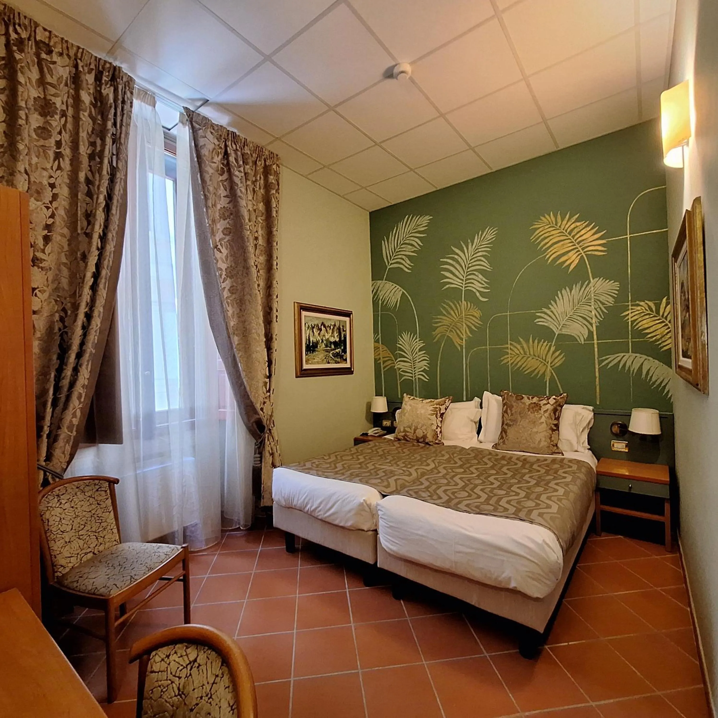 Bed in Hotel Maxim Axial