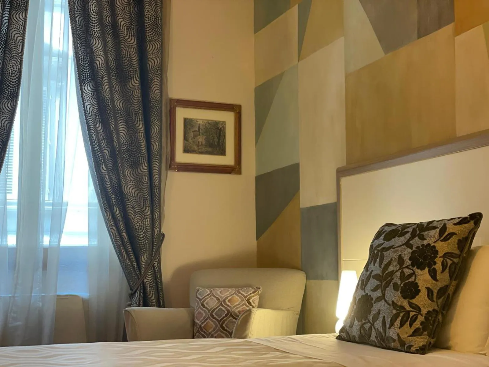 Bed in Hotel Maxim Axial