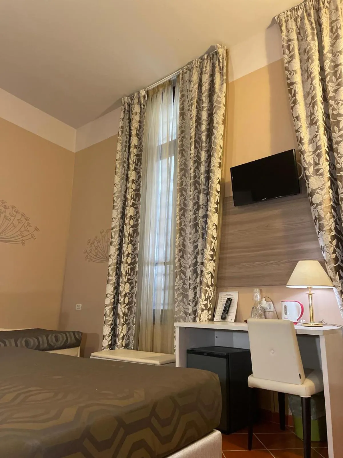 Bed in Hotel Maxim Axial