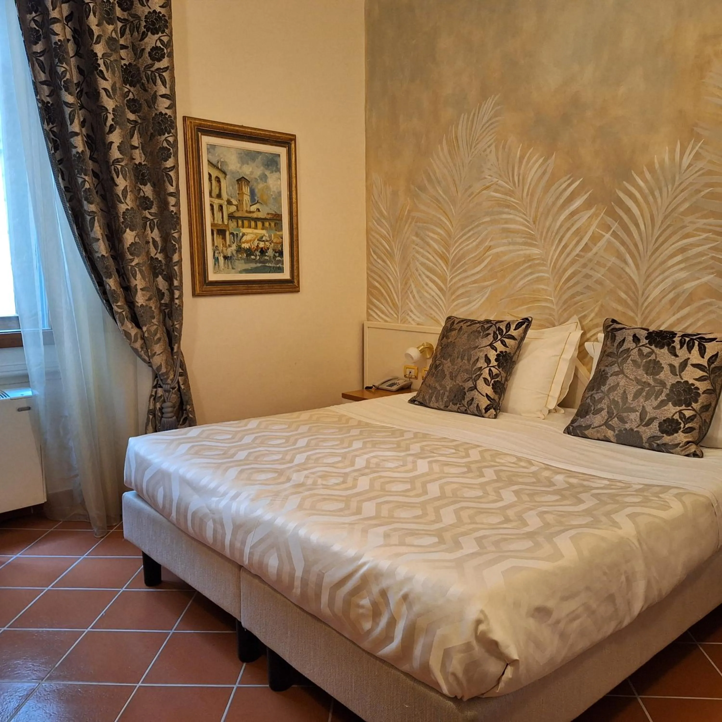 Bed in Hotel Maxim Axial