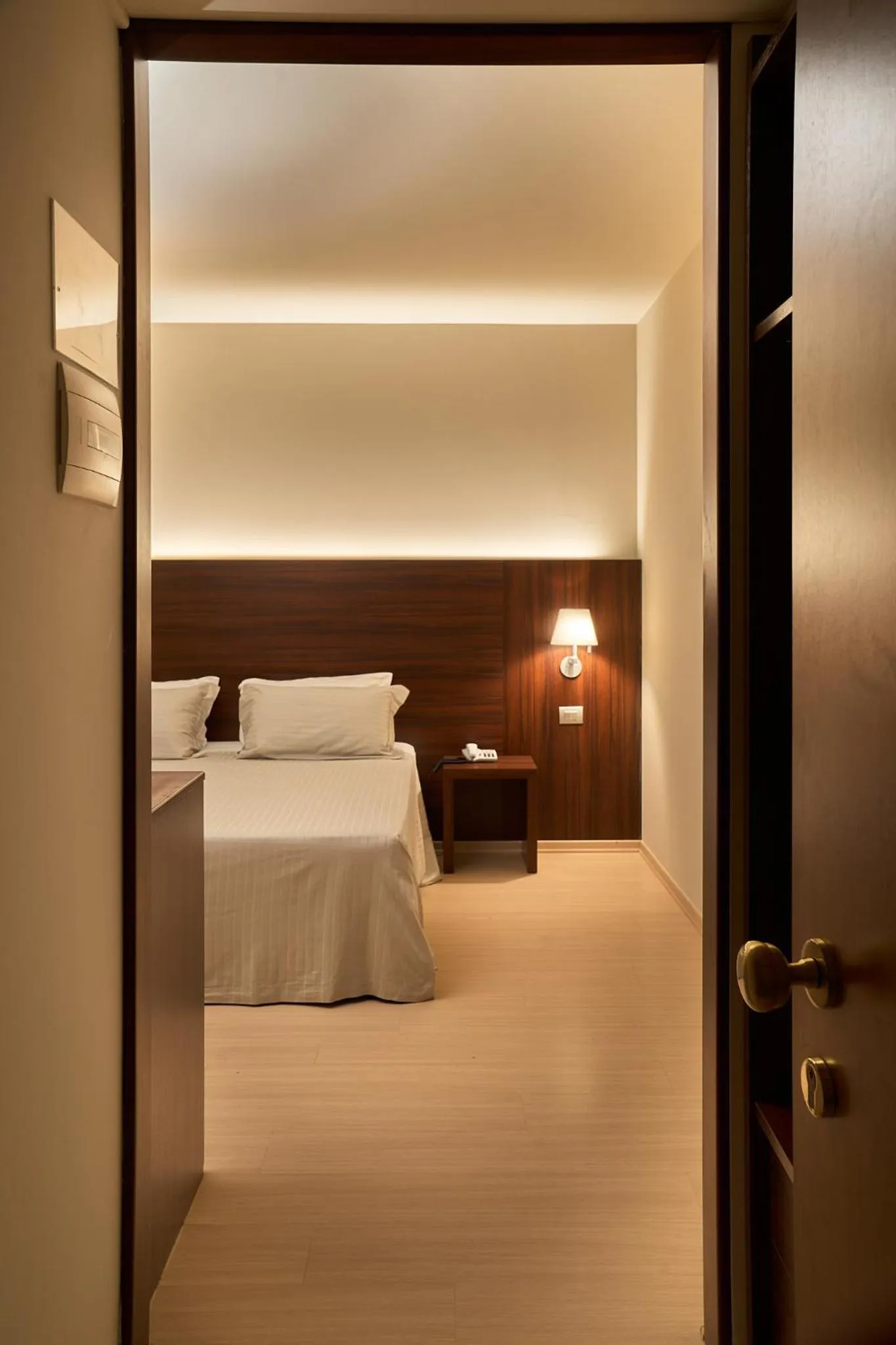 Bed in Delfina Palace Hotel