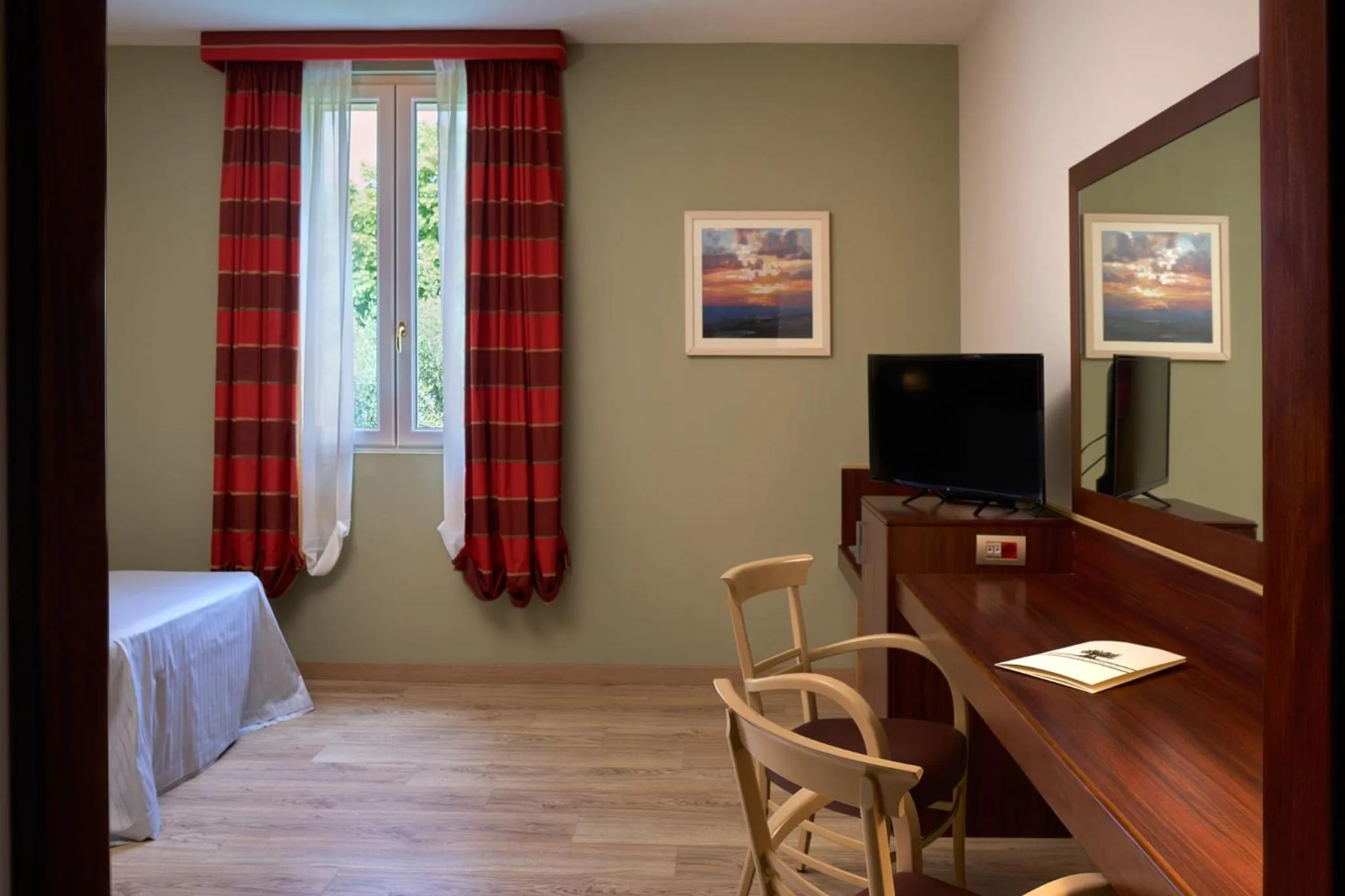 Bed in Delfina Palace Hotel