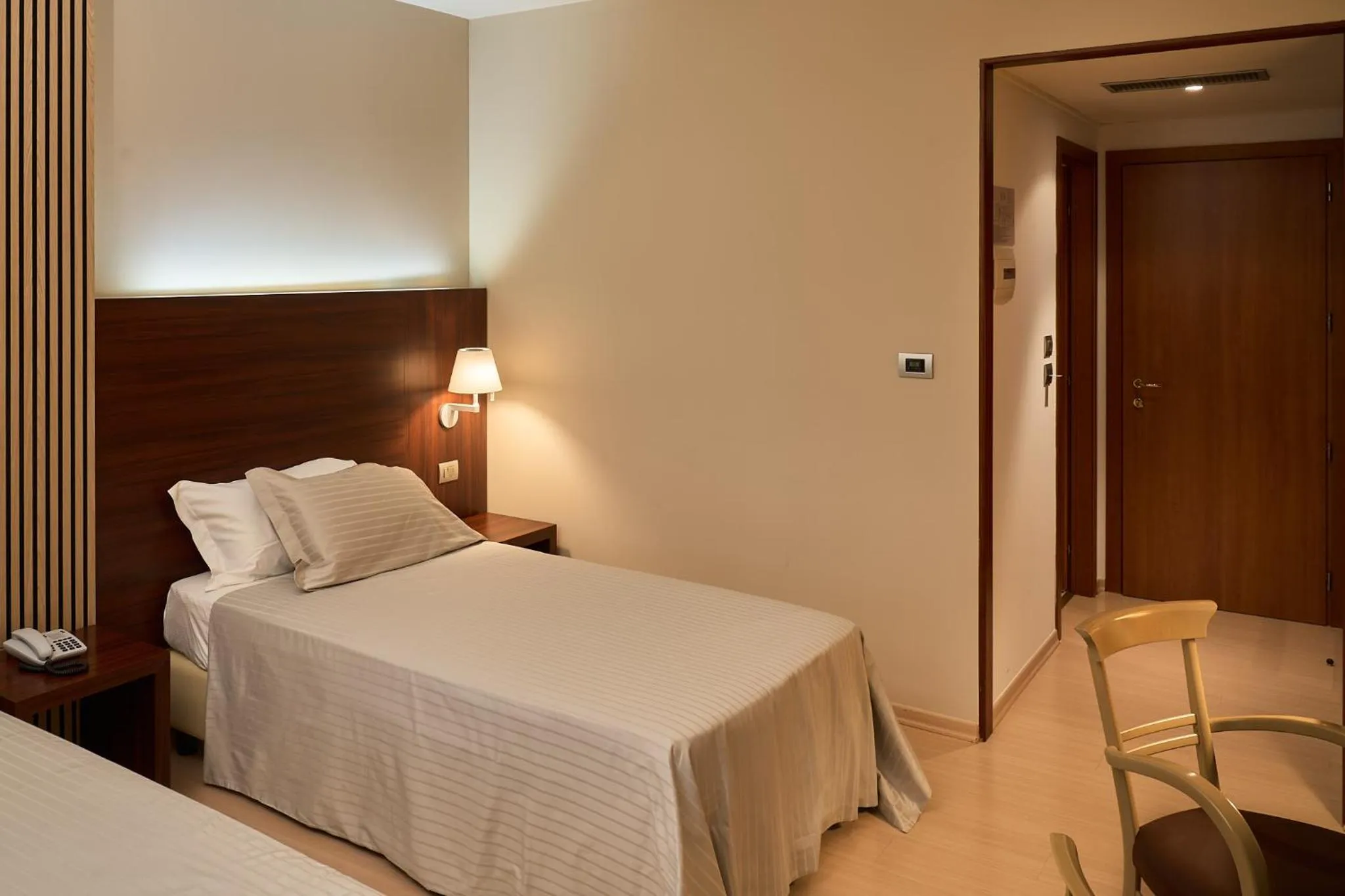 Bed in Delfina Palace Hotel