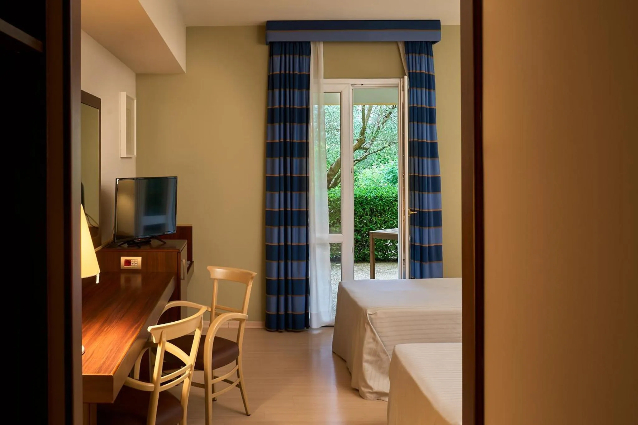 Patio, Bed in Delfina Palace Hotel