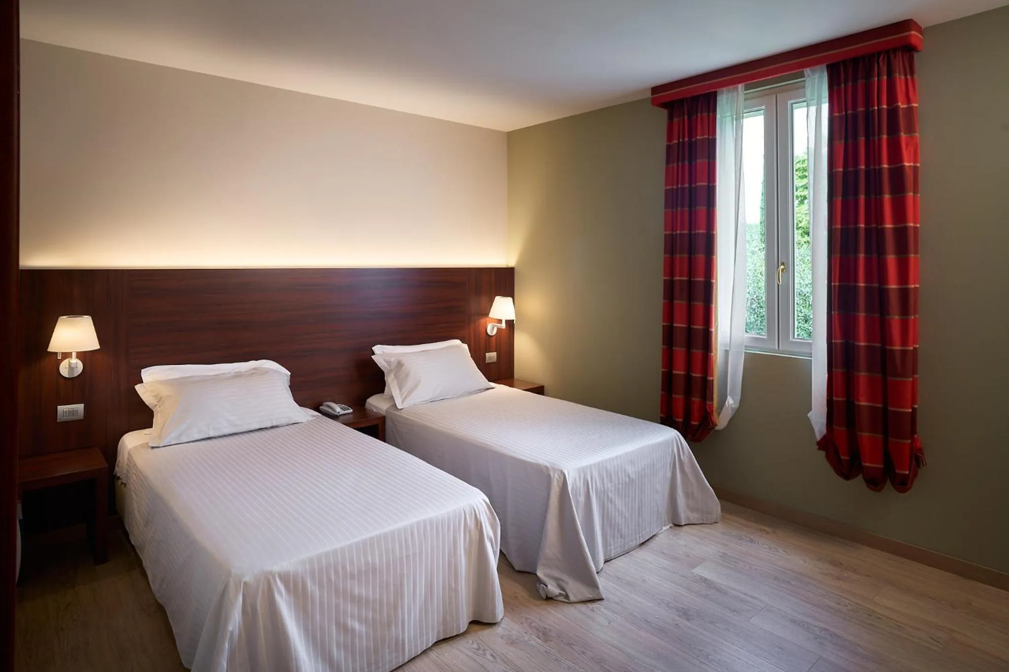 Bed in Delfina Palace Hotel