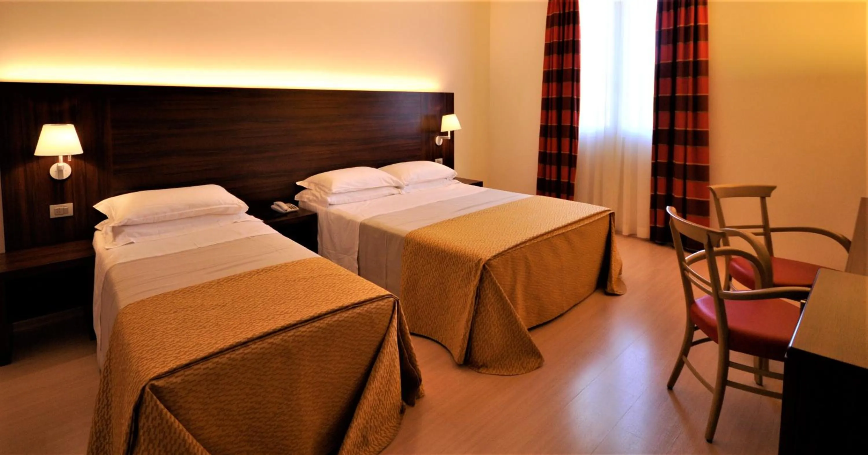 Bed in Delfina Palace Hotel