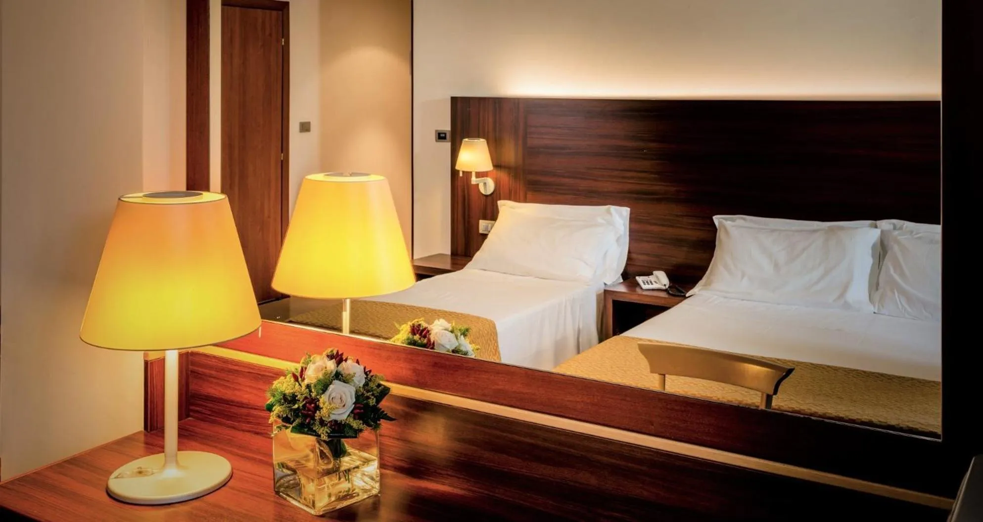 Bed in Delfina Palace Hotel