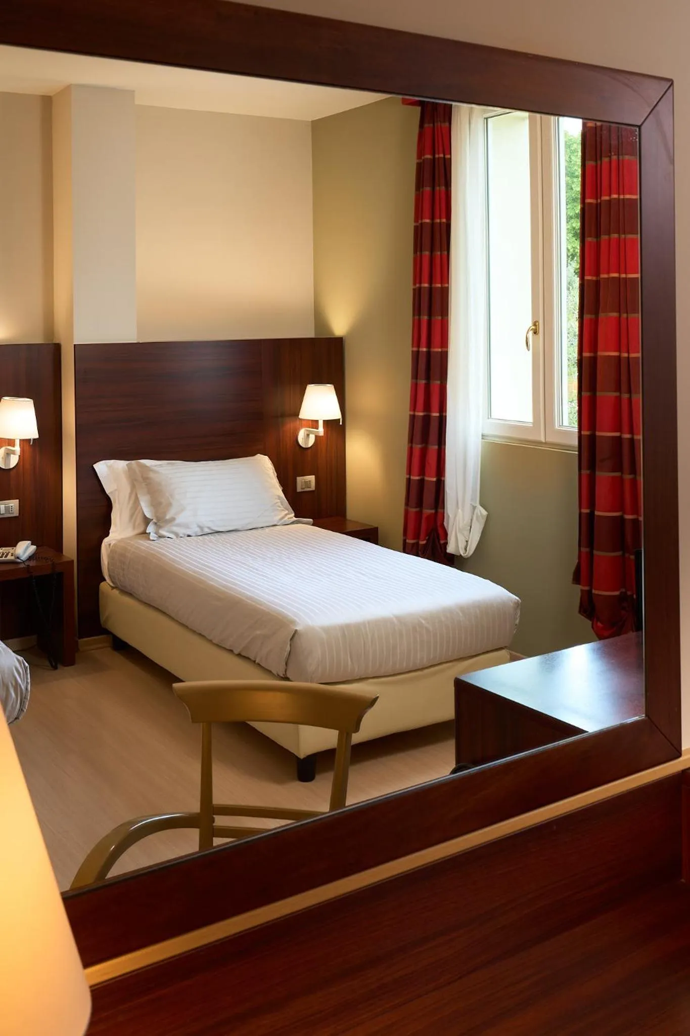 Bed in Delfina Palace Hotel