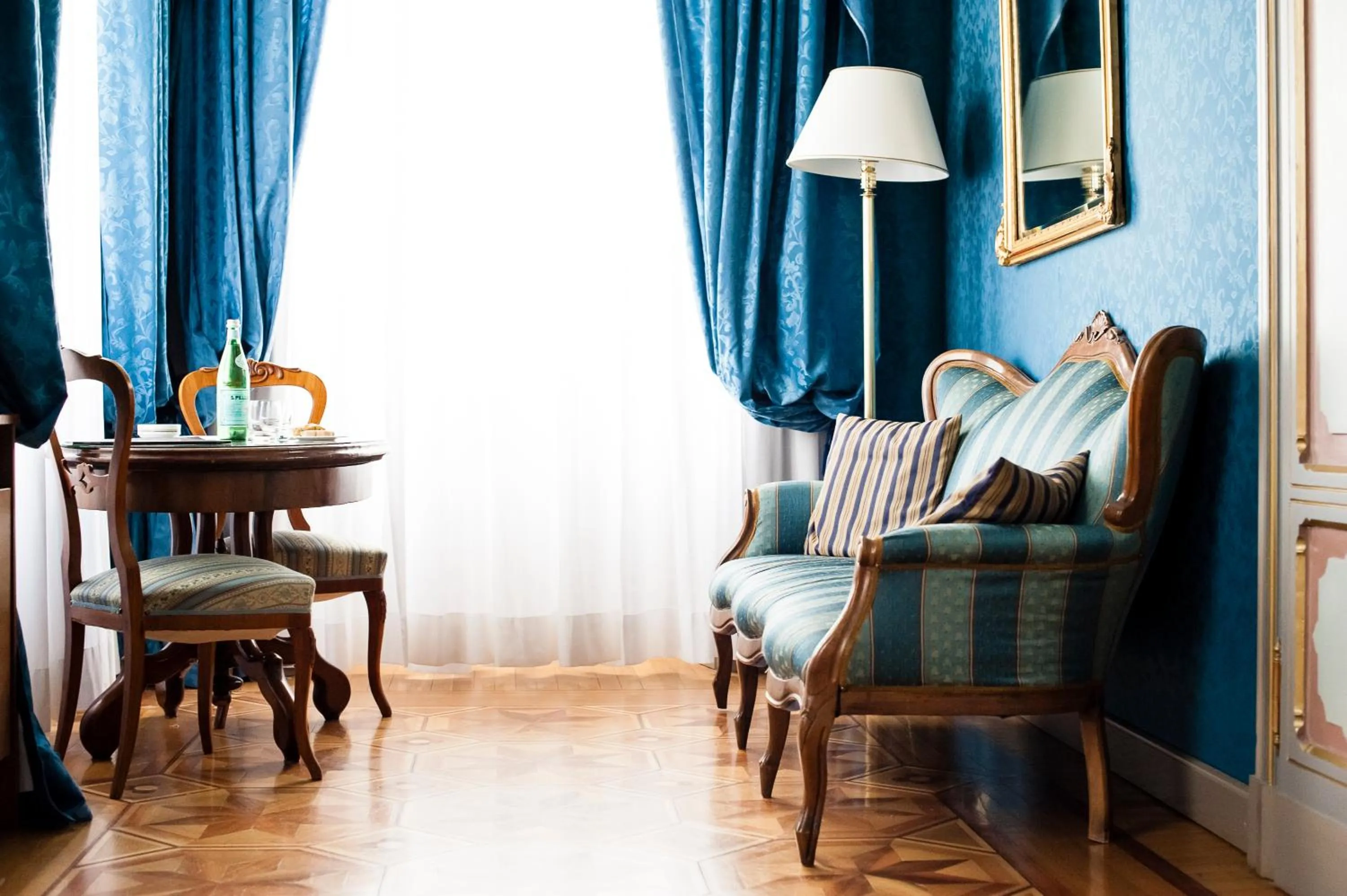 Seating area in Relais & Chateaux Villa Crespi