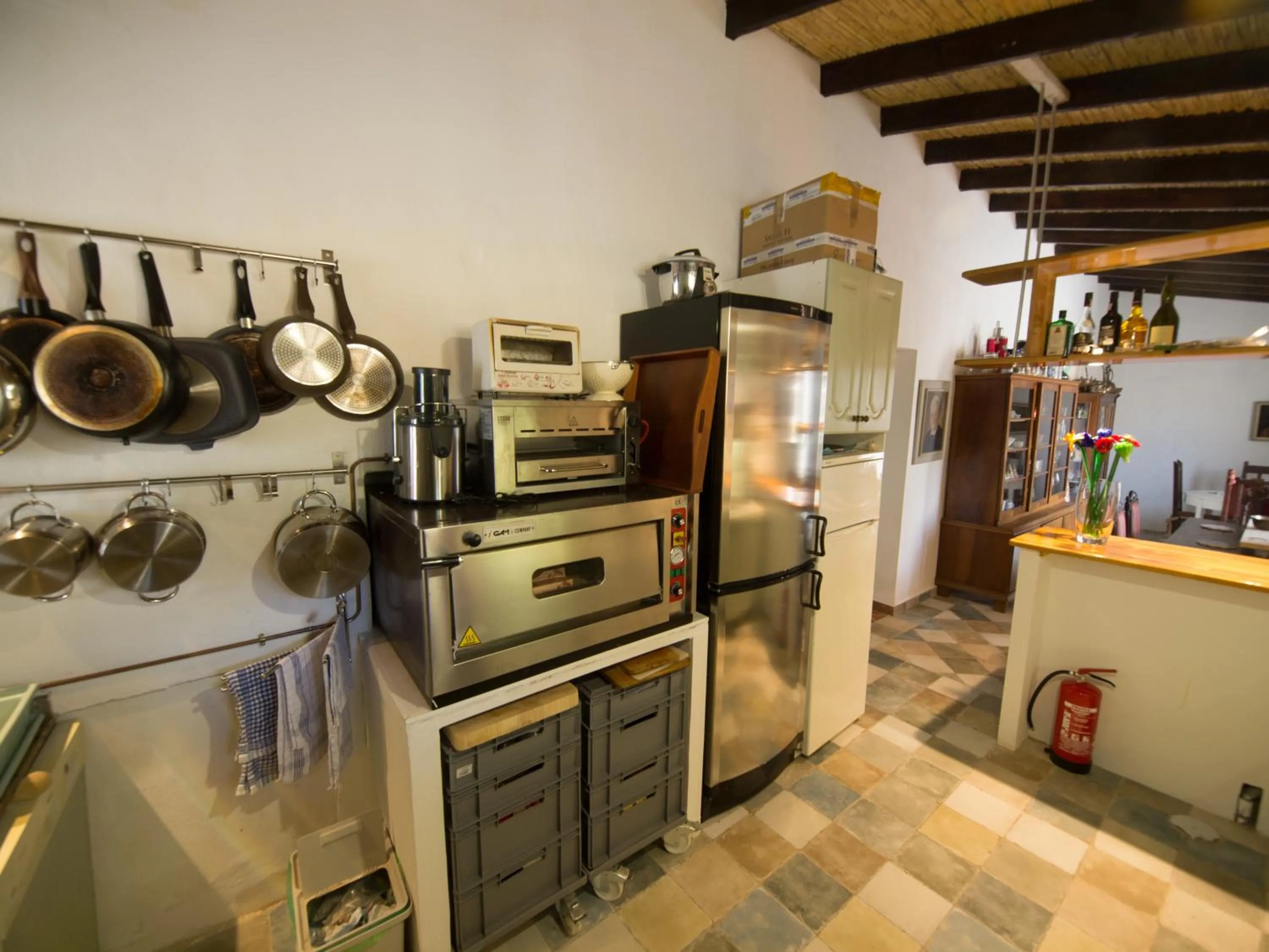 Communal kitchen in Guest House Bellaguarda