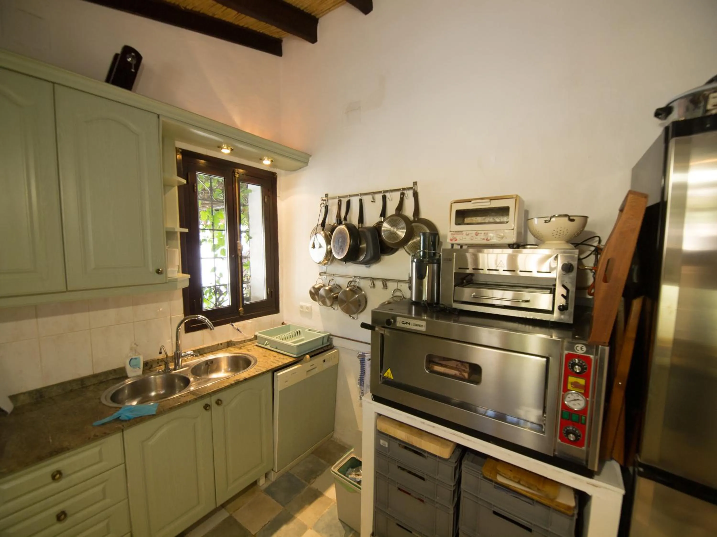 Kitchen or kitchenette in Guest House Bellaguarda