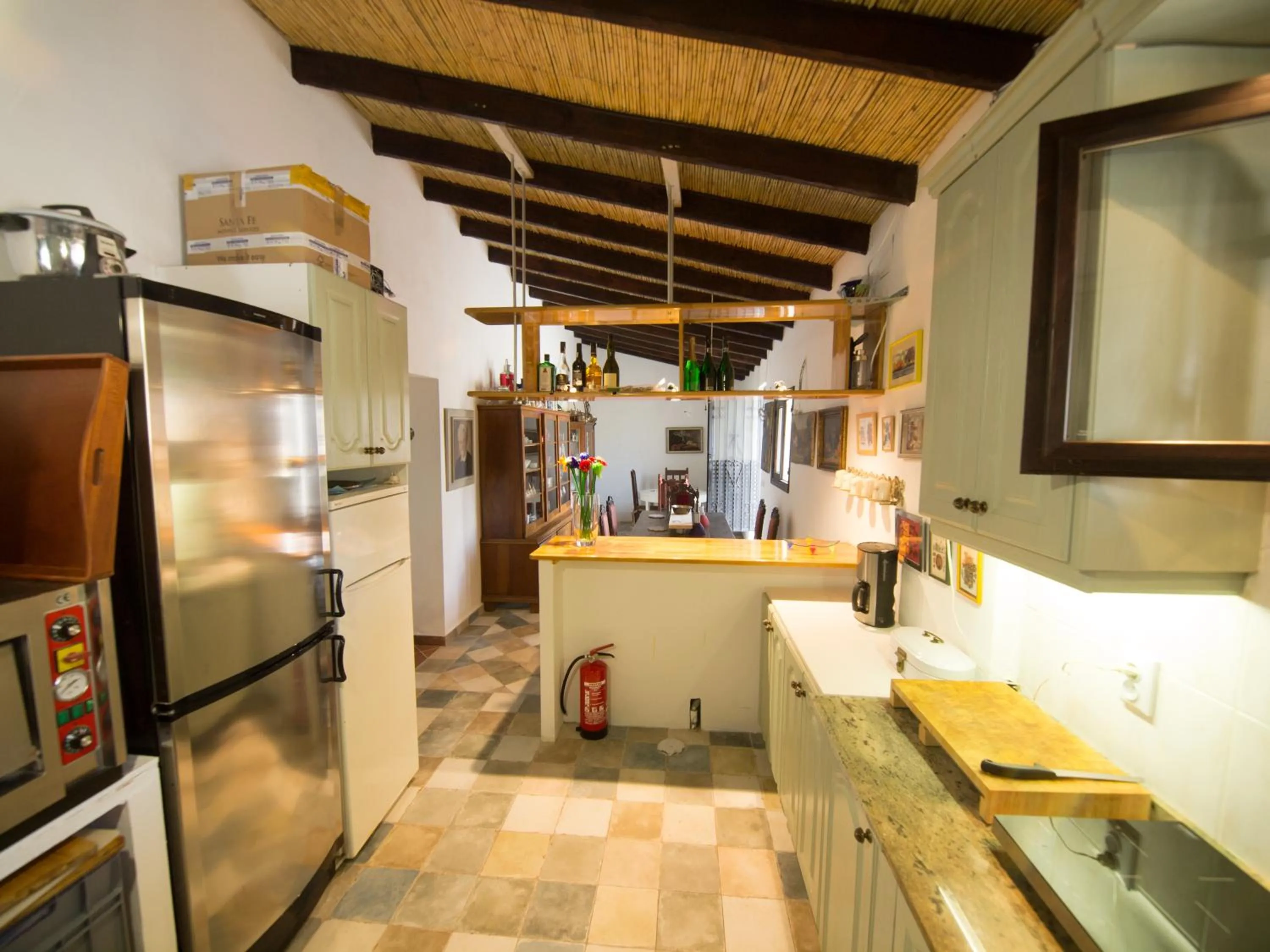 Communal kitchen in Guest House Bellaguarda
