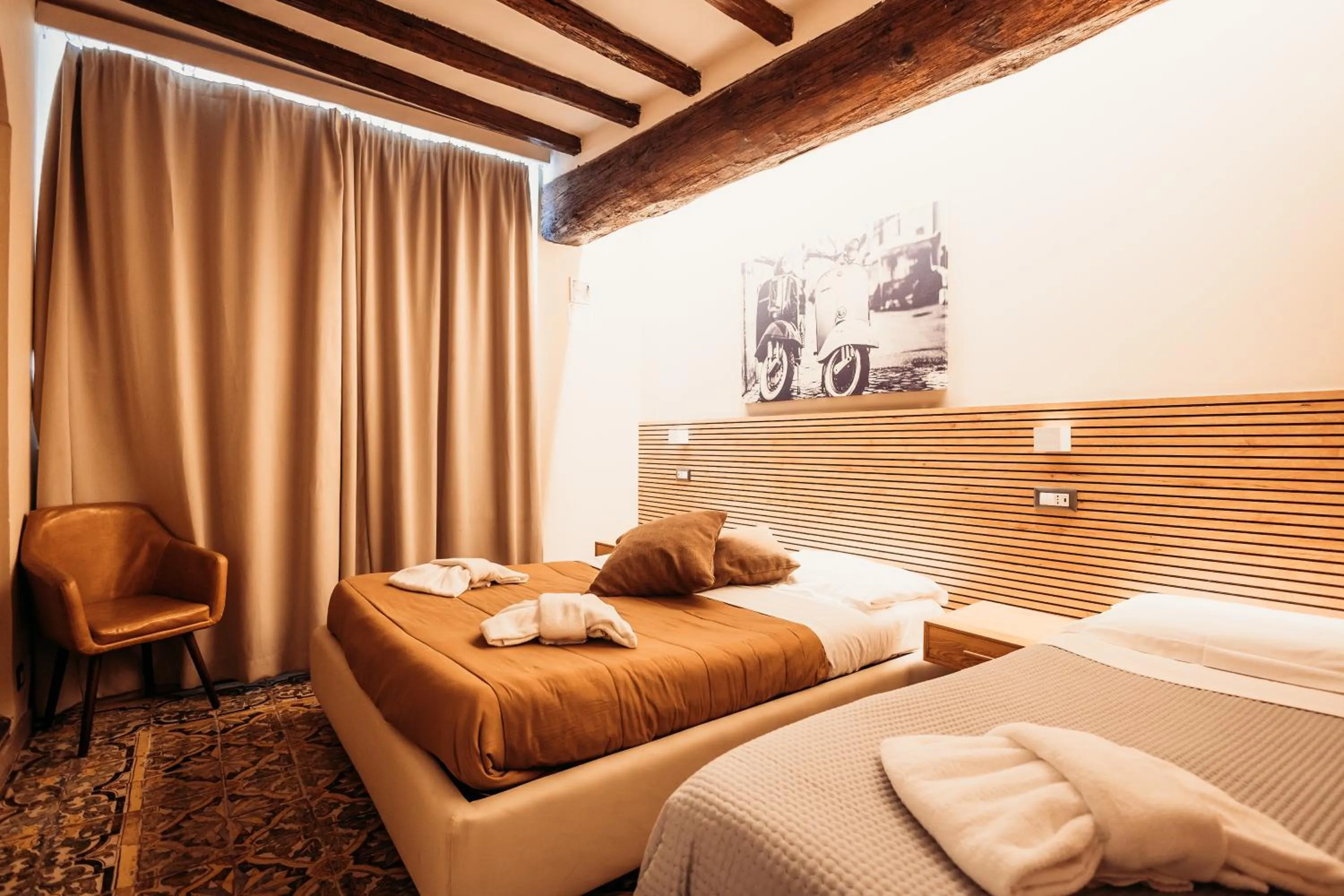Bed in Hotel Domus Tiberina