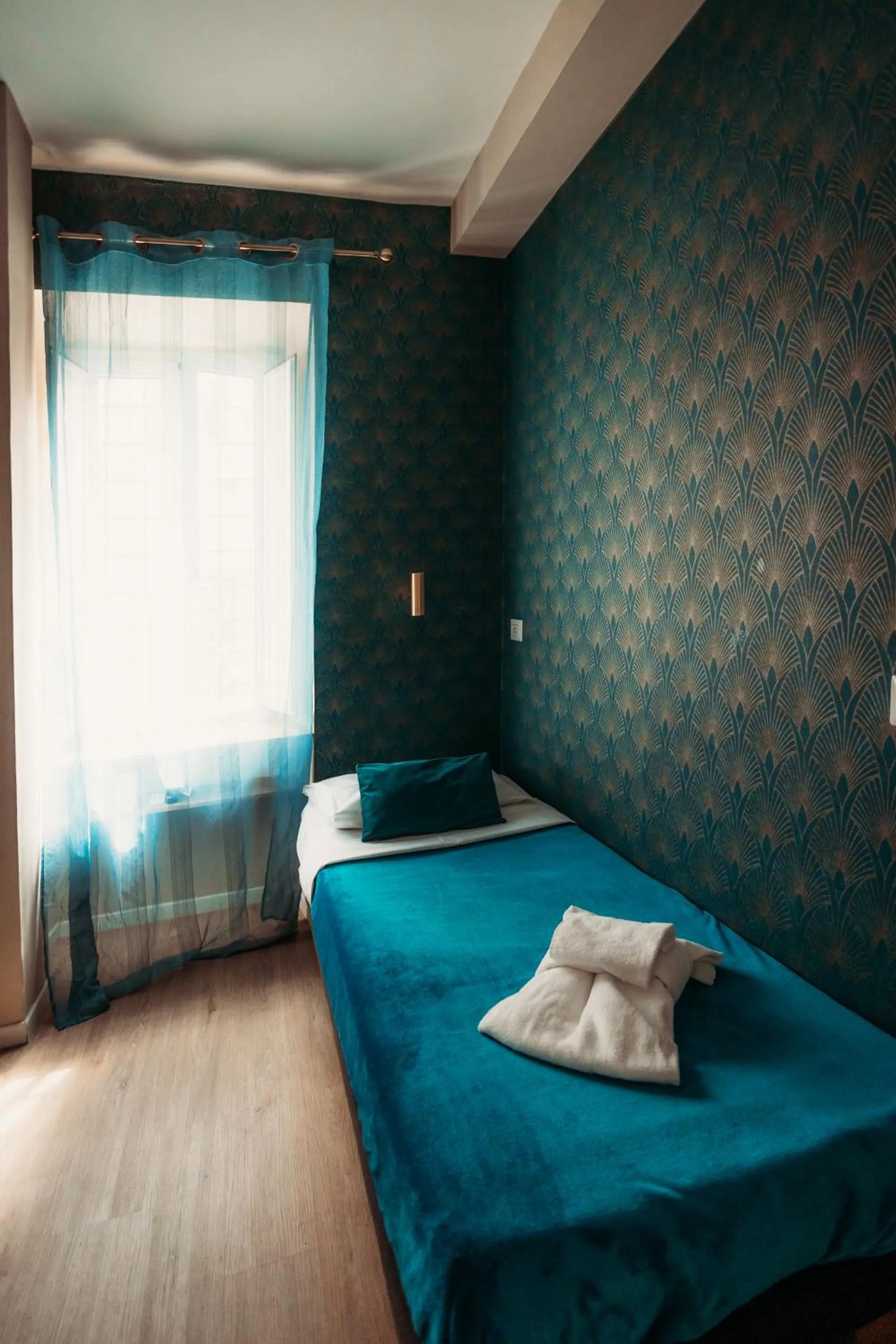 Bed in Hotel Domus Tiberina