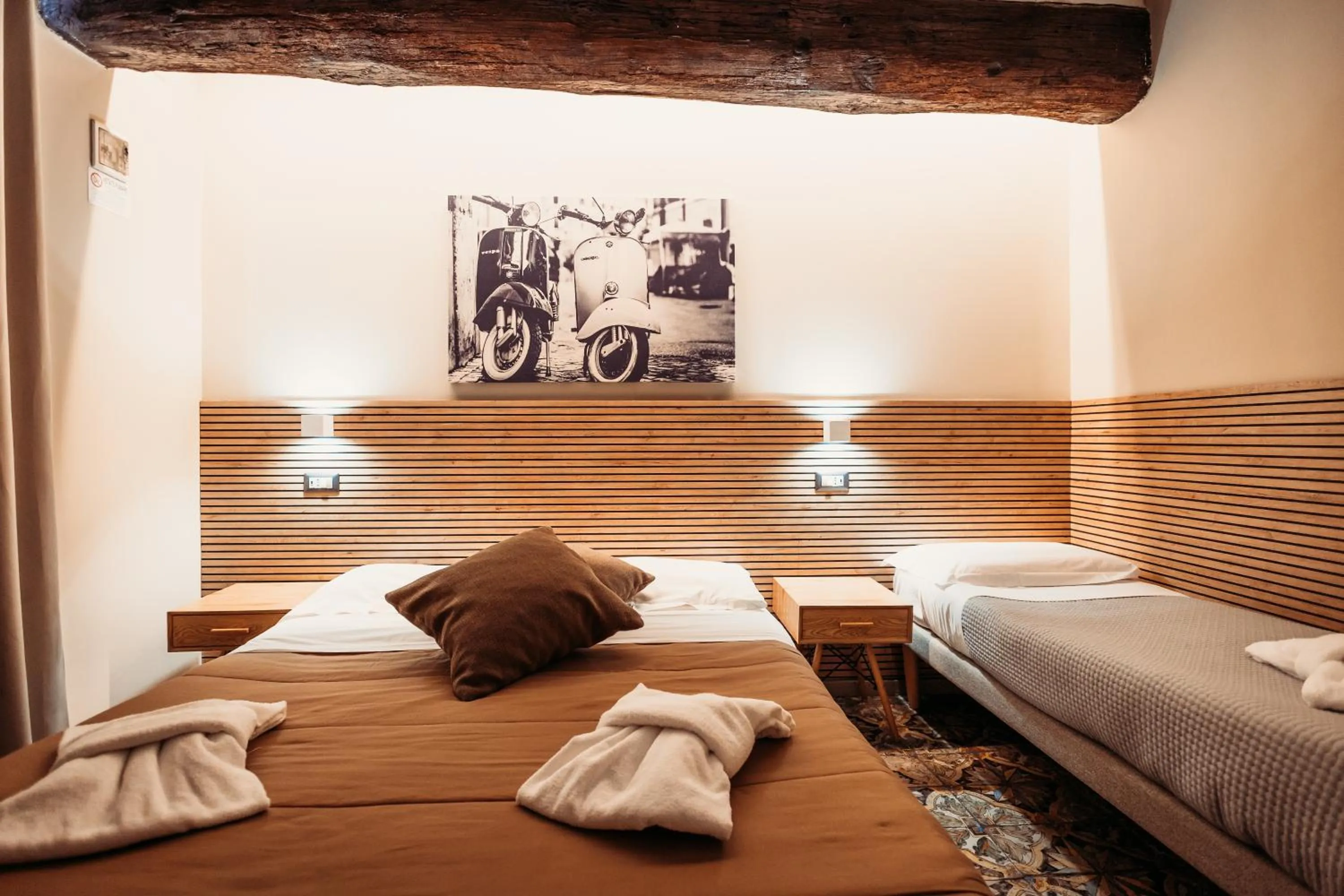 Bed in Hotel Domus Tiberina