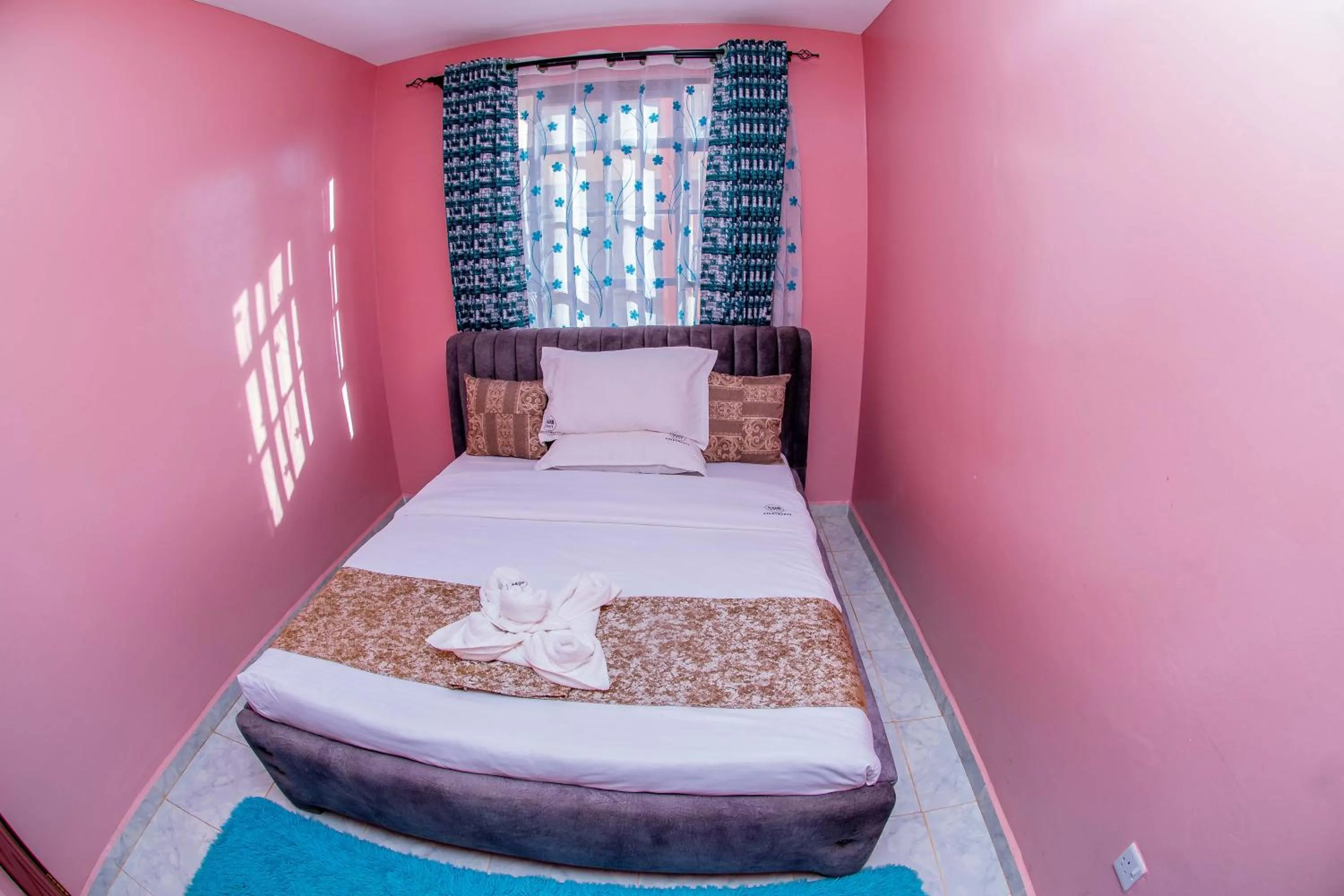 Bed in A&B Cozy Apartments Kitale
