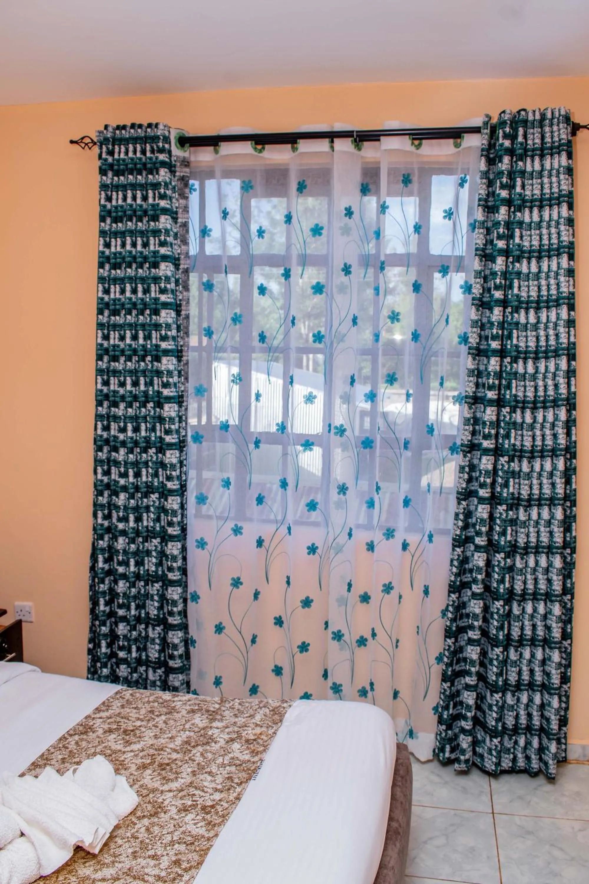 Bed in A&B Cozy Apartments Kitale