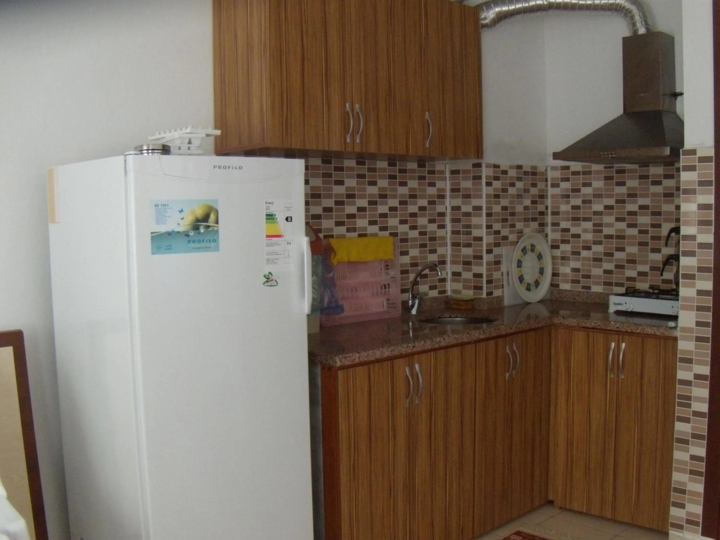 Kitchen or kitchenette in Sercan Apart