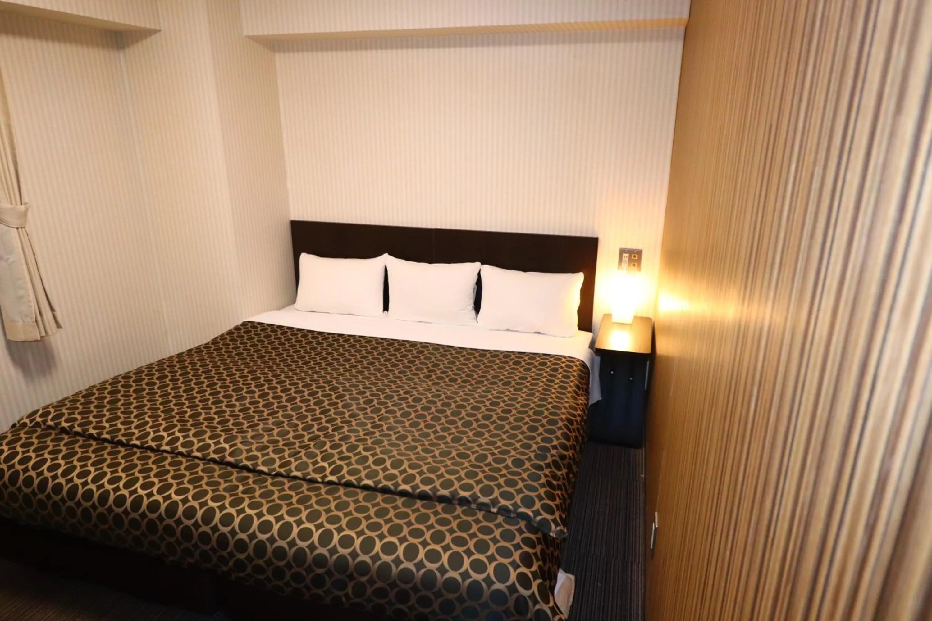 Bed in HOTEL THE GARDEN Ⅵ ICHINOMIYA