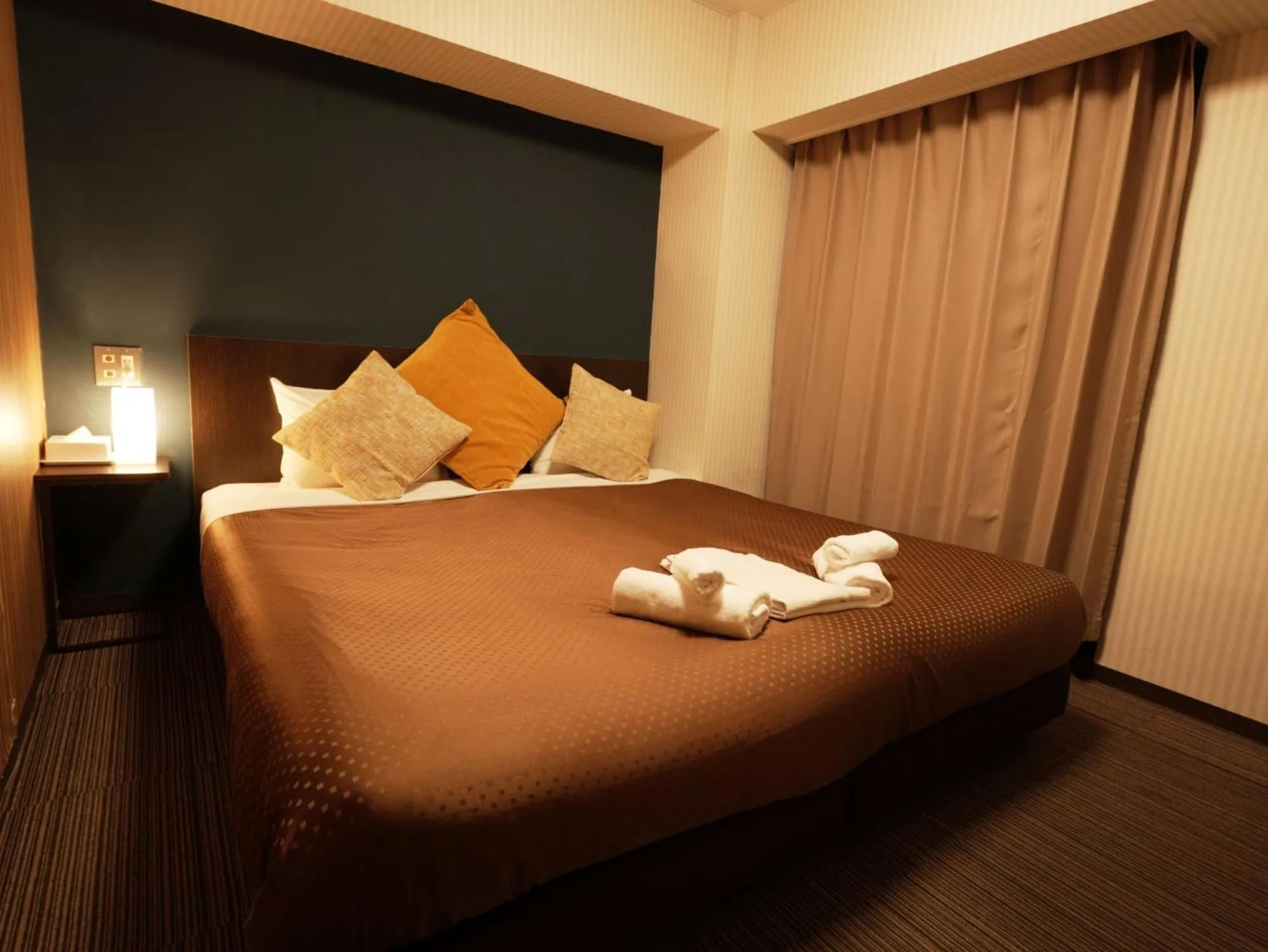 Bed in HOTEL THE GARDEN Ⅵ ICHINOMIYA