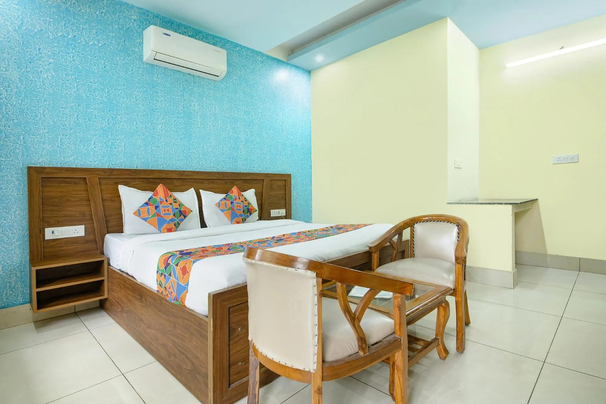 Bed in FabHotel Crestwood Inn