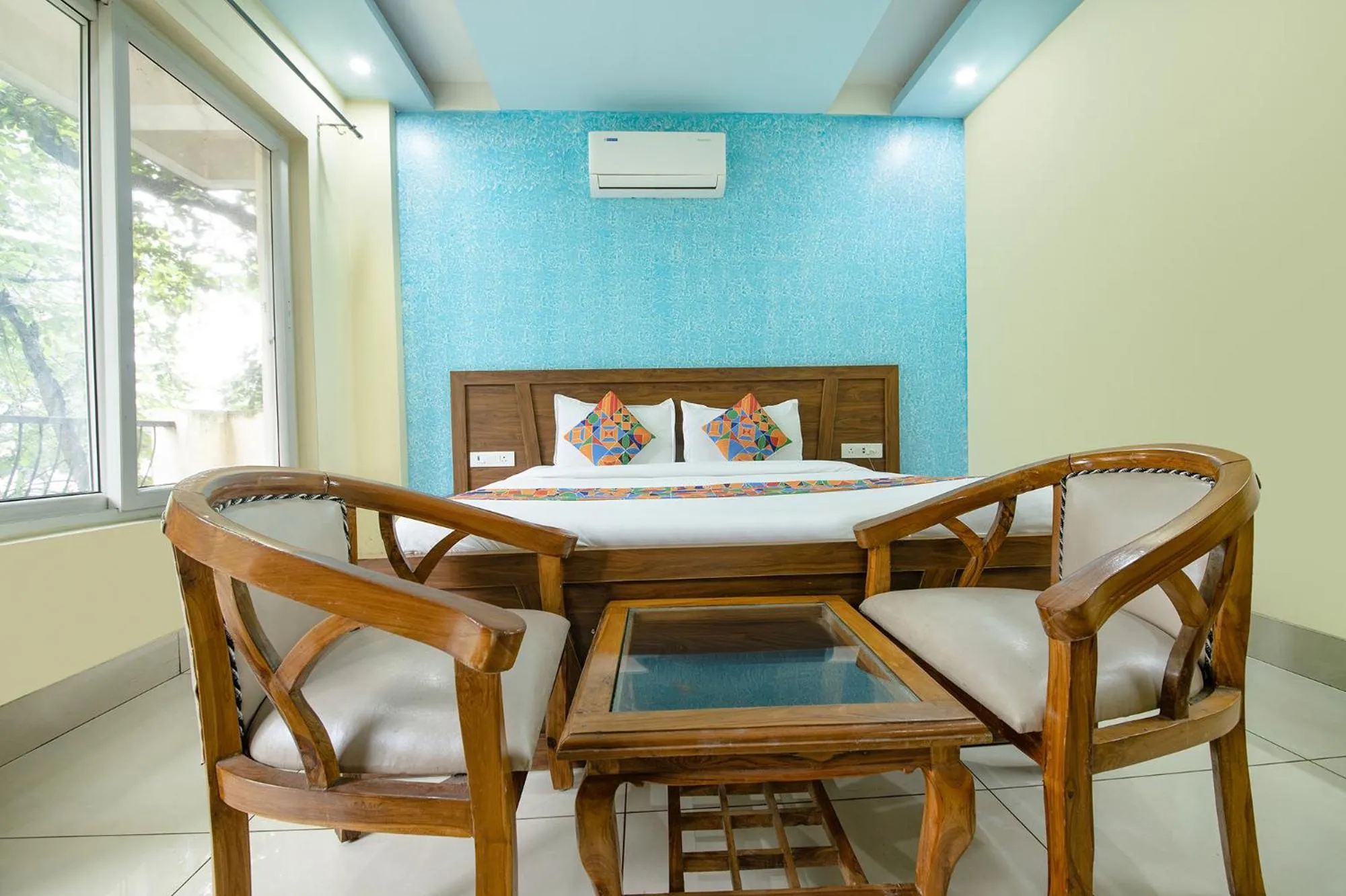 Bed in FabHotel Crestwood Inn