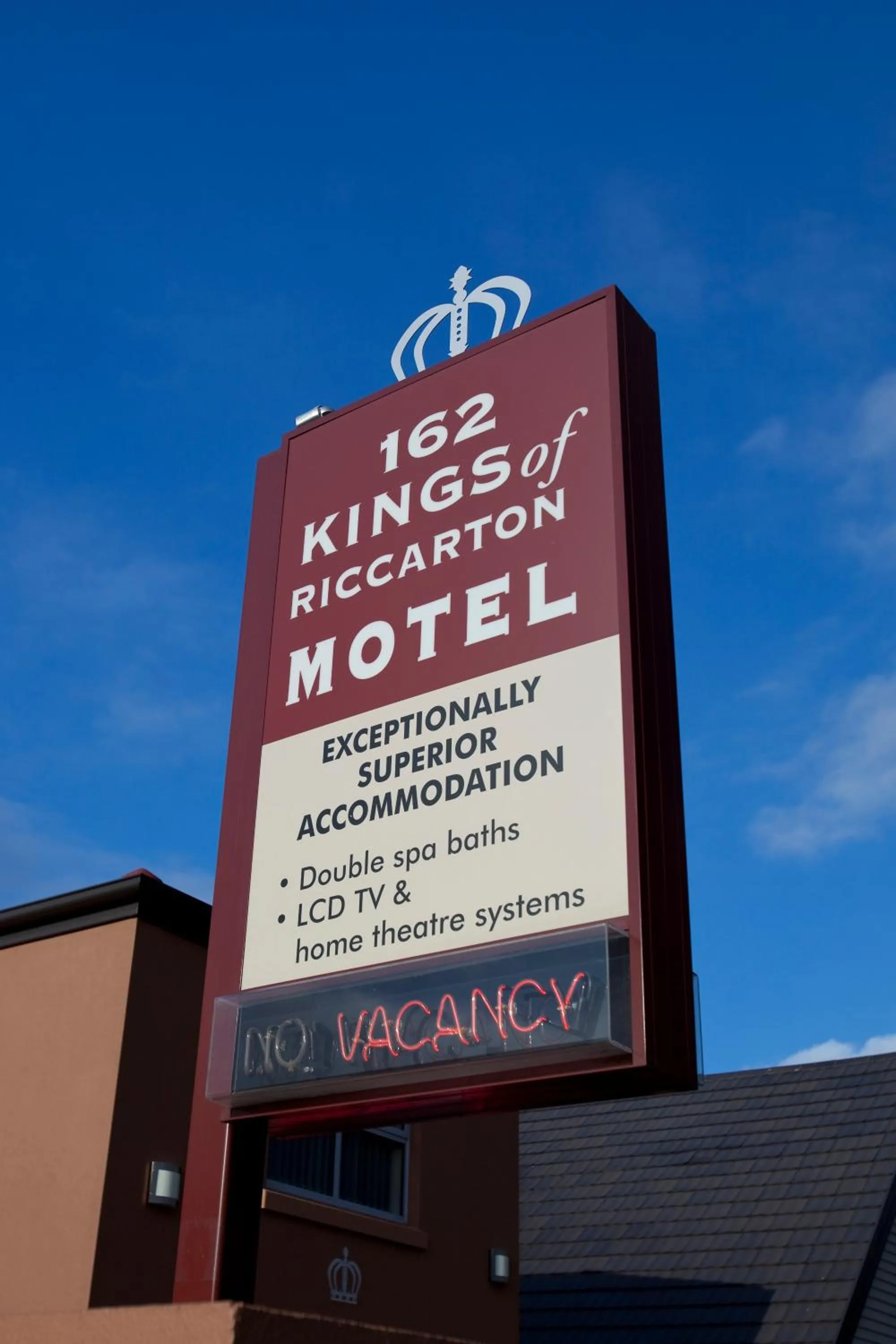Property logo or sign in Kings Of Riccarton Motel- Close to Railway Station and Airport with Shuttle service