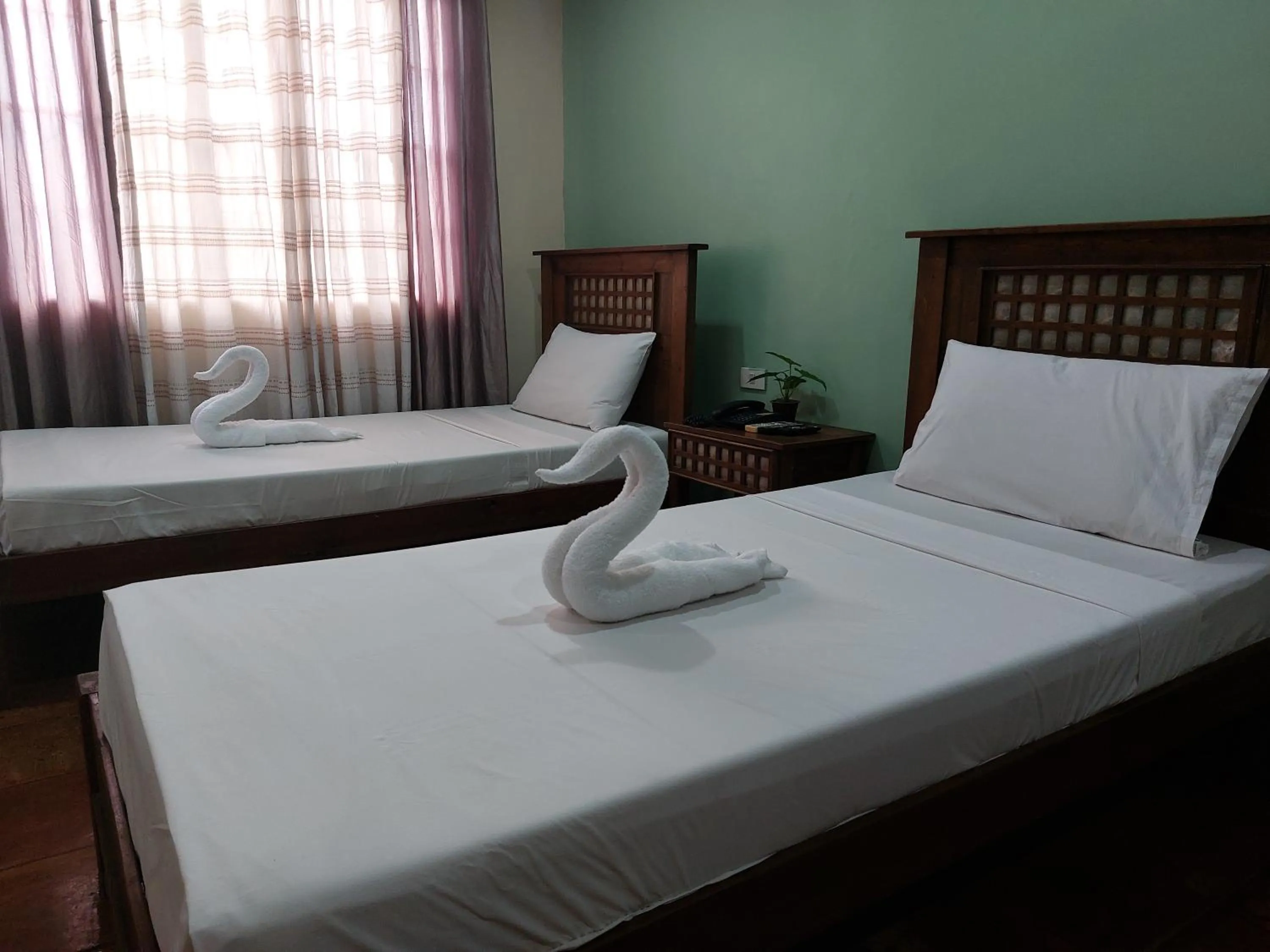 Bed in Makabata Guesthouse & Cafe