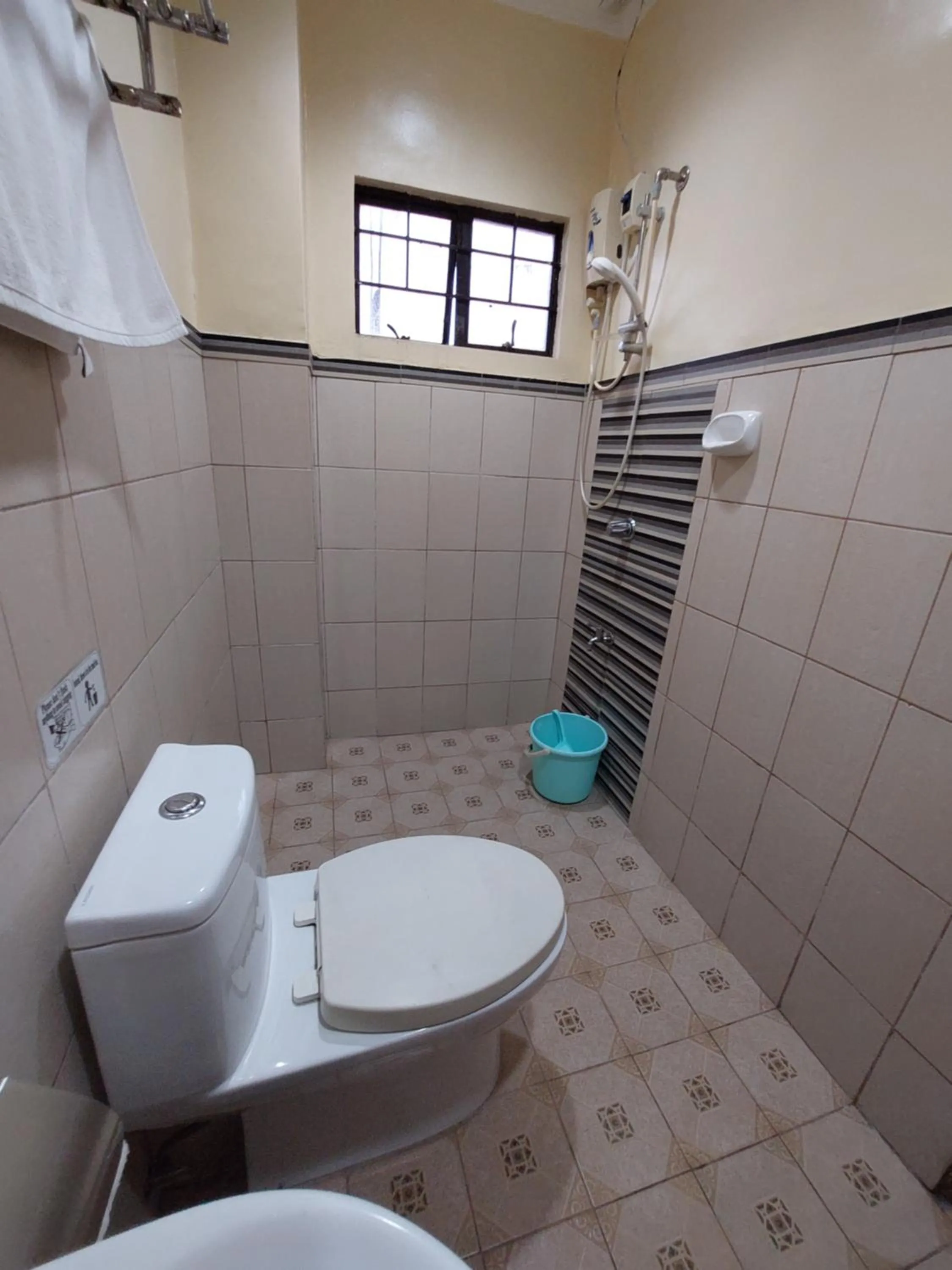 Toilet in Makabata Guesthouse & Cafe