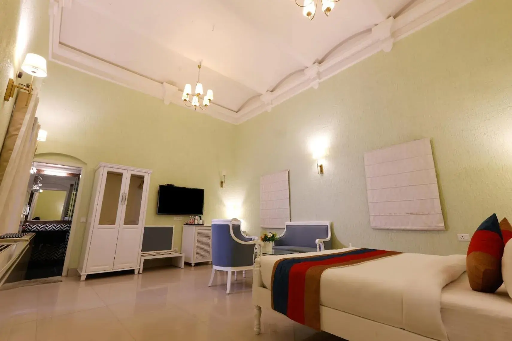 Bedroom in Saroja Heritage, Varanasi Bedroom in Saroja Heritage, Varanasi