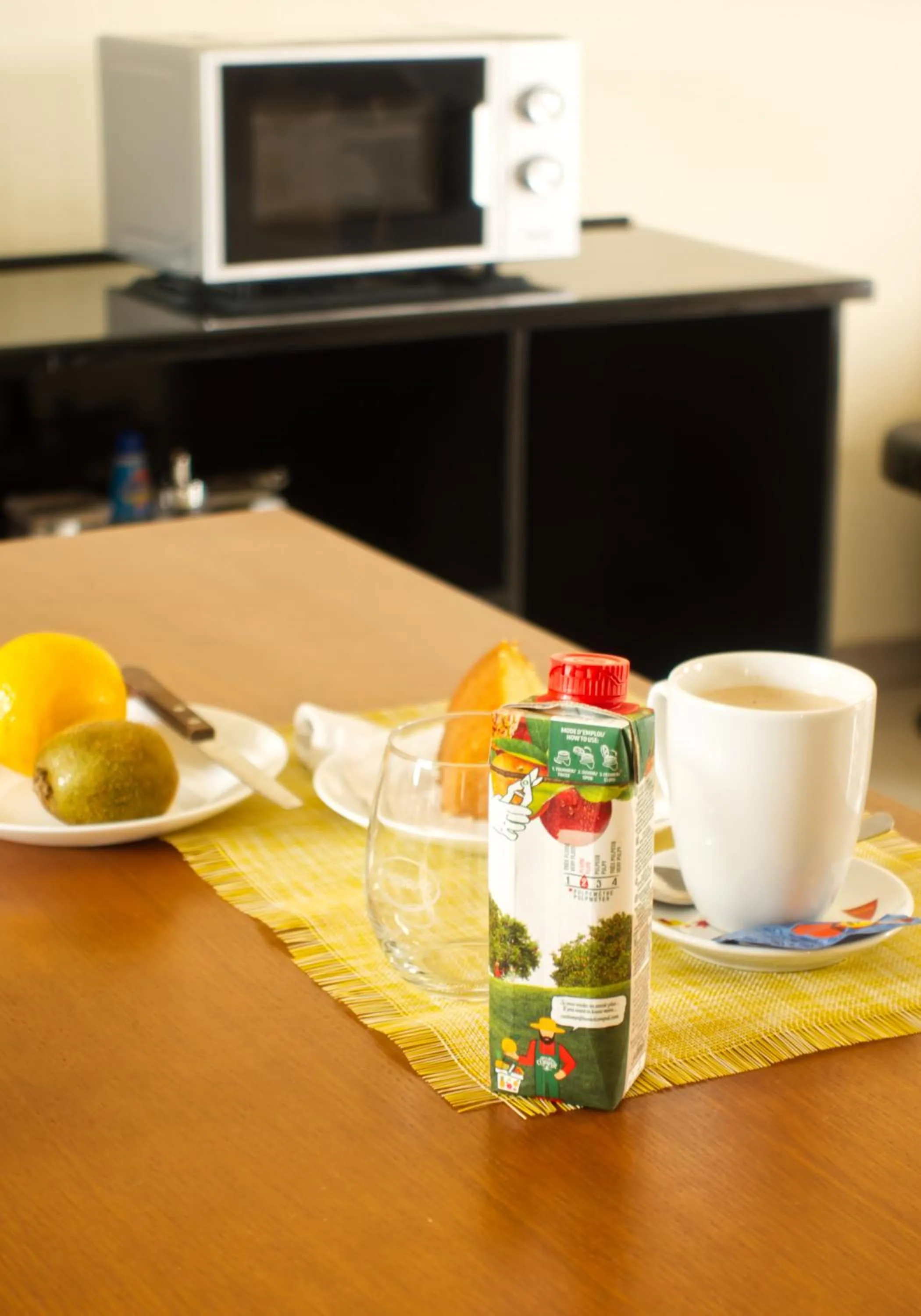 Kitchen or kitchenette in Praia Capital Residence Aparthotel