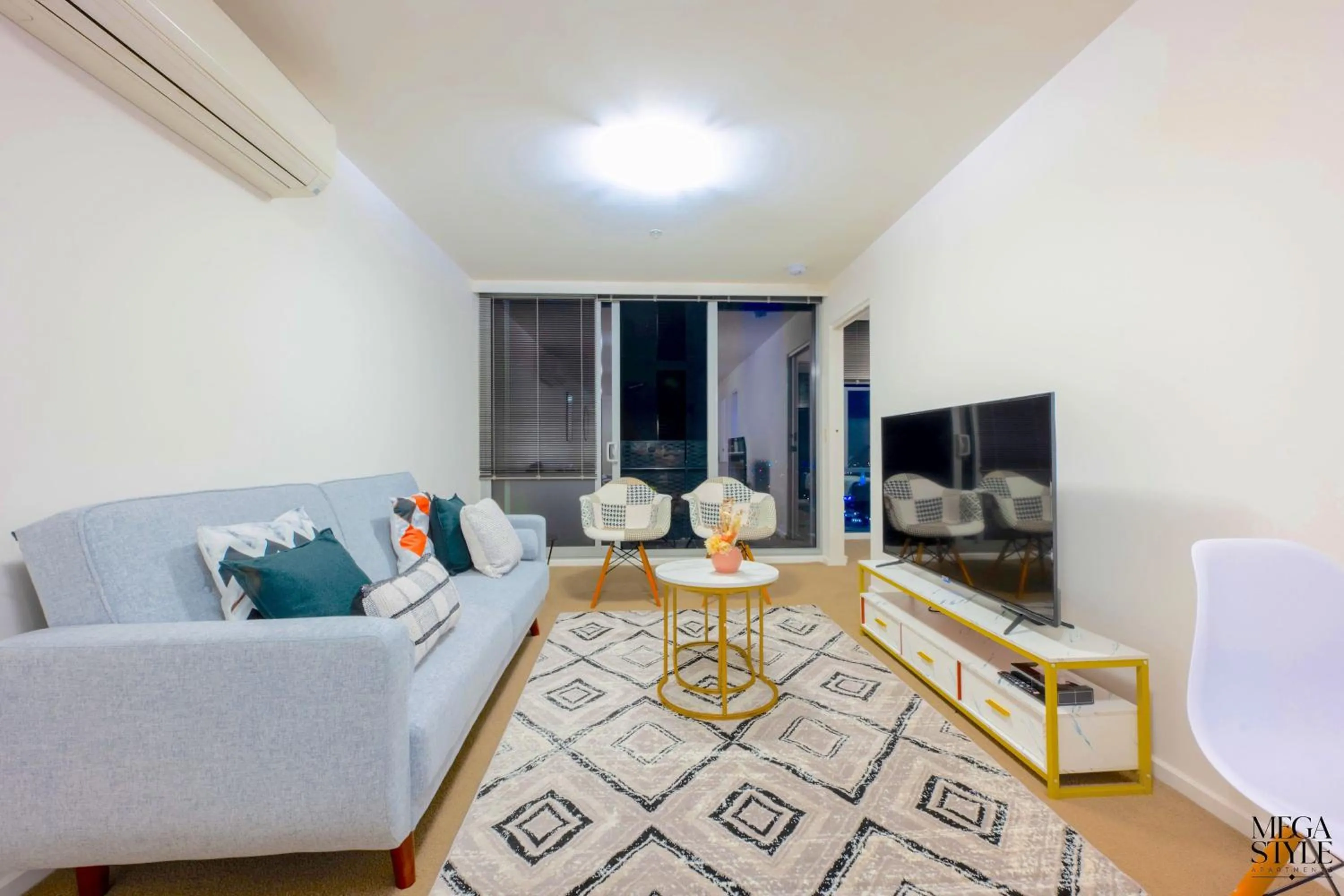 Communal lounge/ TV room in Mega Style Apartments Mainpoint