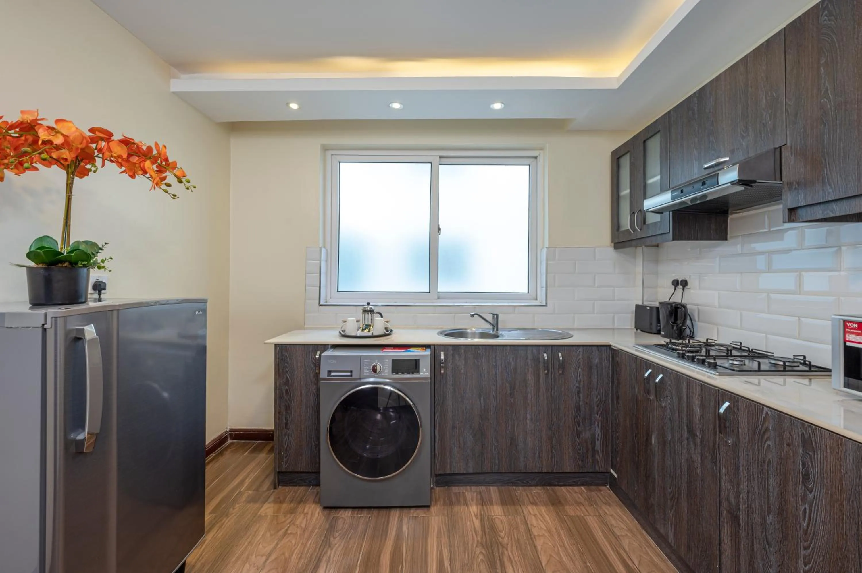washing machine in Roma Court Serviced Apartments