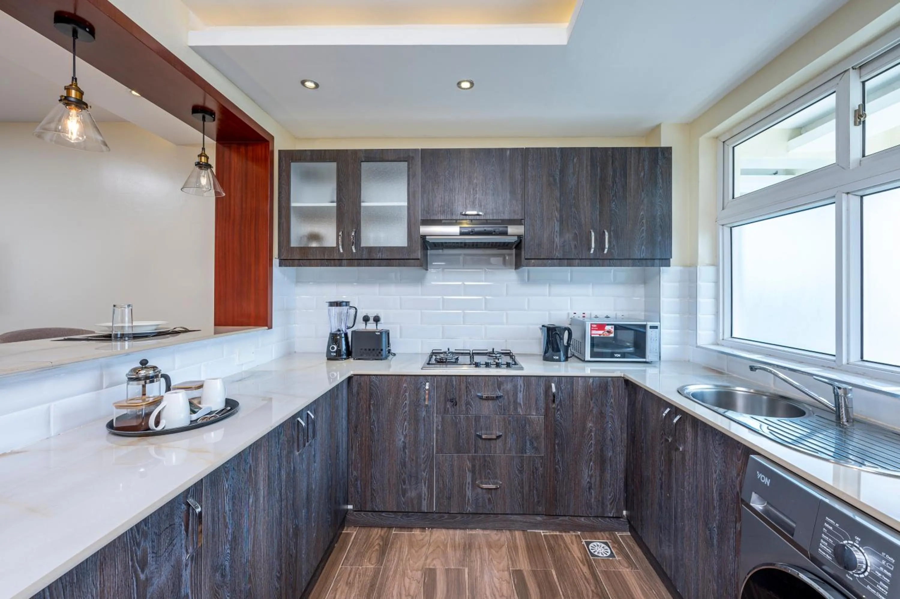 Kitchen or kitchenette in Roma Court Serviced Apartments