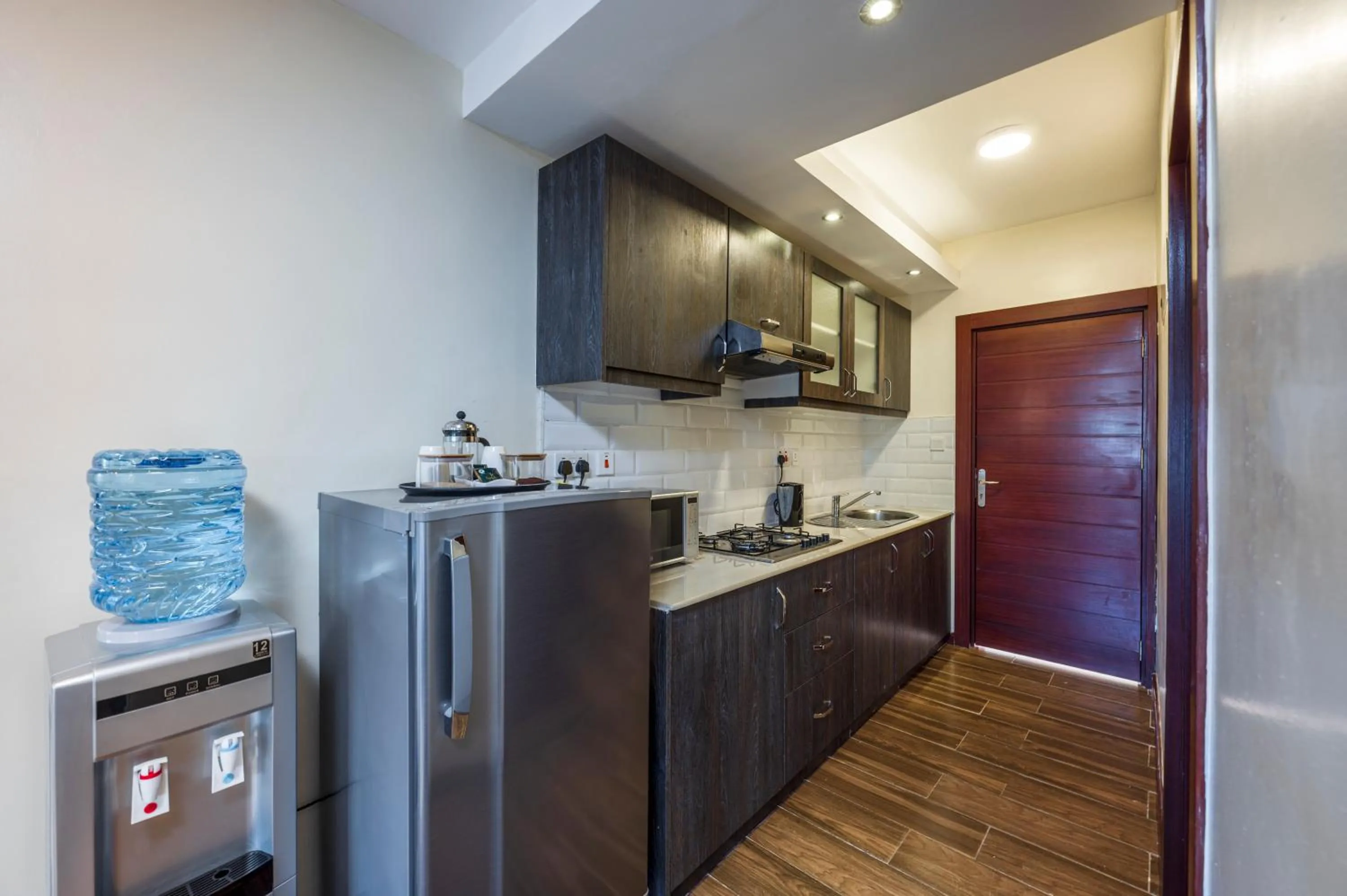 Kitchen or kitchenette in Roma Court Serviced Apartments
