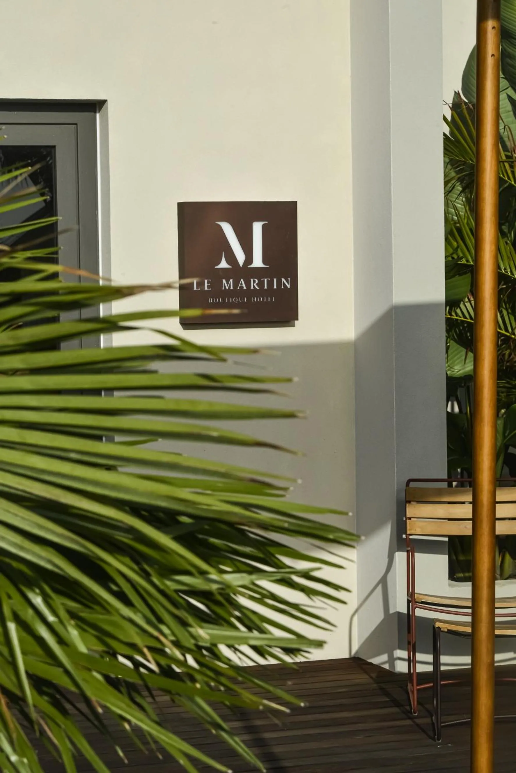 Property logo or sign in Le Martin Boutique Hôtel