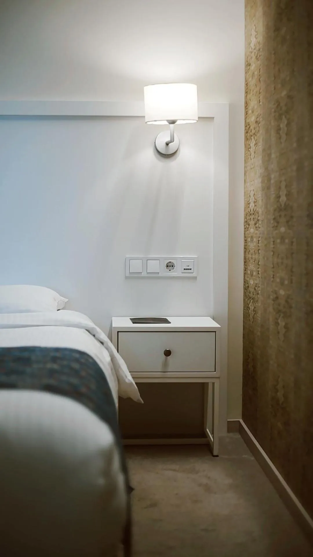 Bed in EPIGRAPH Design Hotel