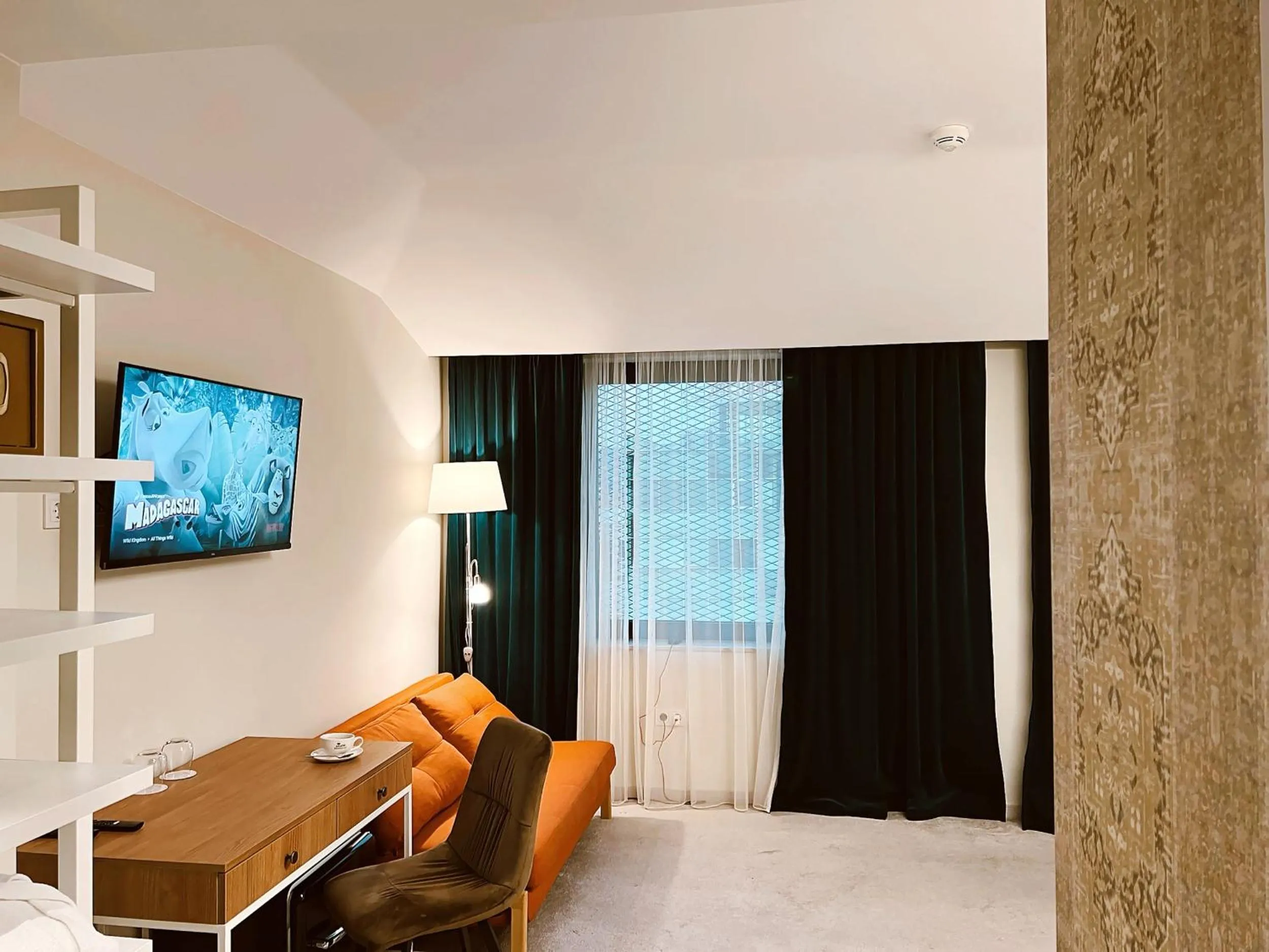 Seating area, Bed in EPIGRAPH Design Hotel