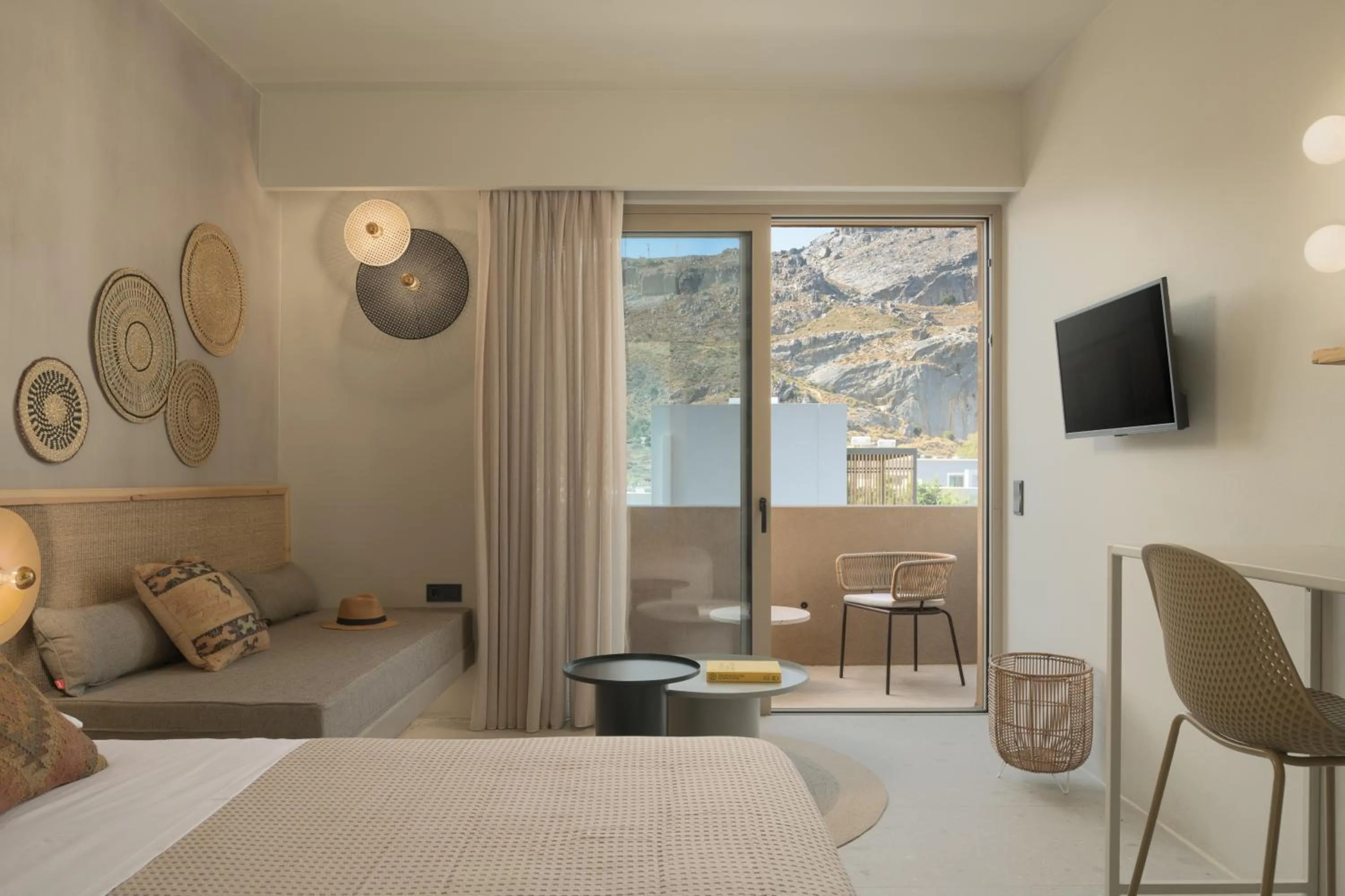 Communal lounge/ TV room, Bed in NERĒA Boutique Hotel