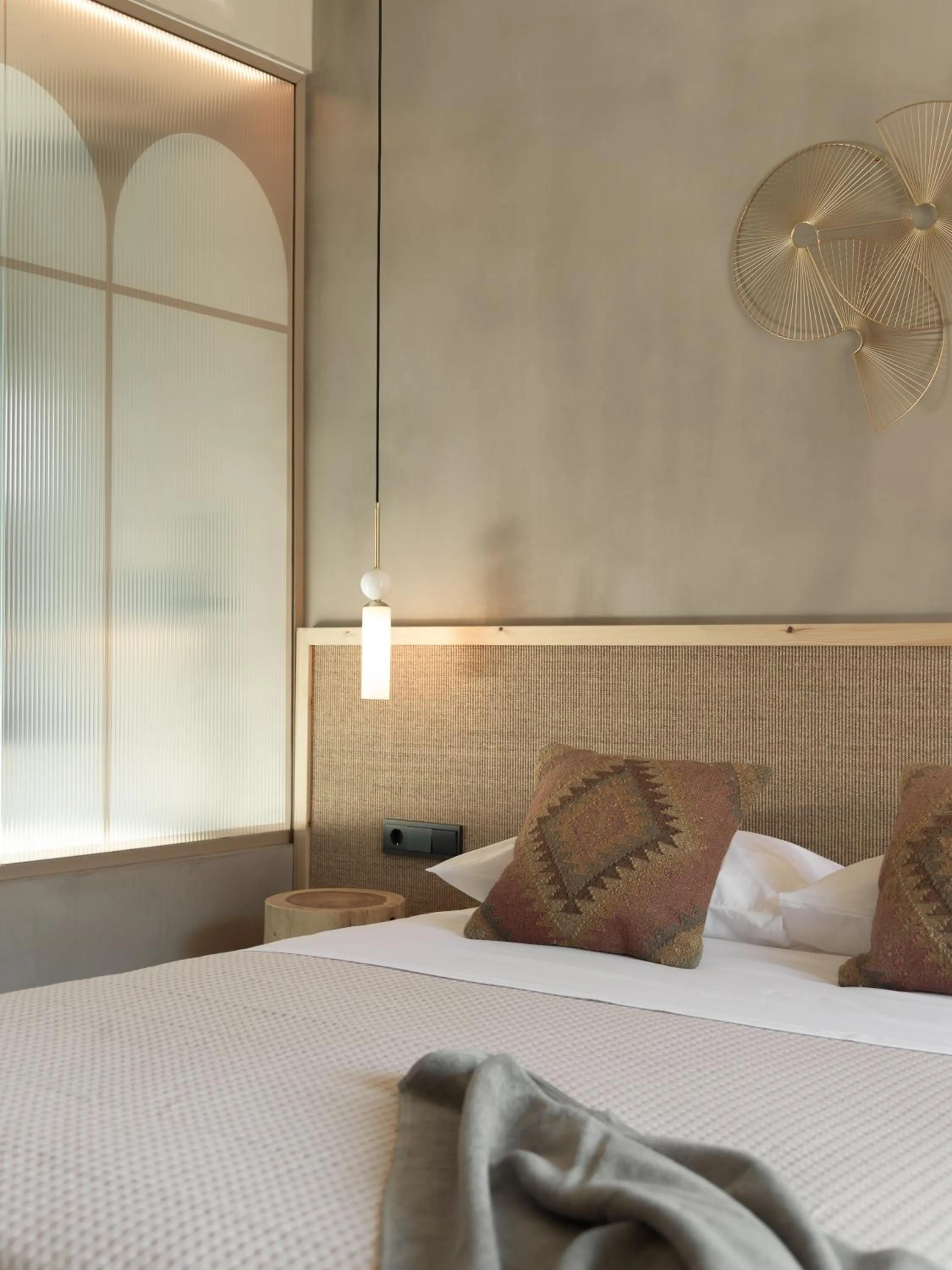 Bed in NERĒA Boutique Hotel