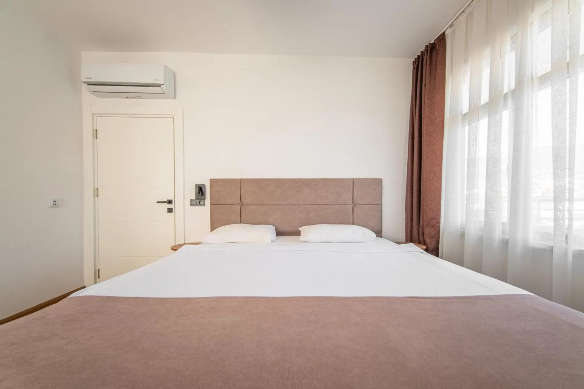 Bed in PASHAM RESIDENCE