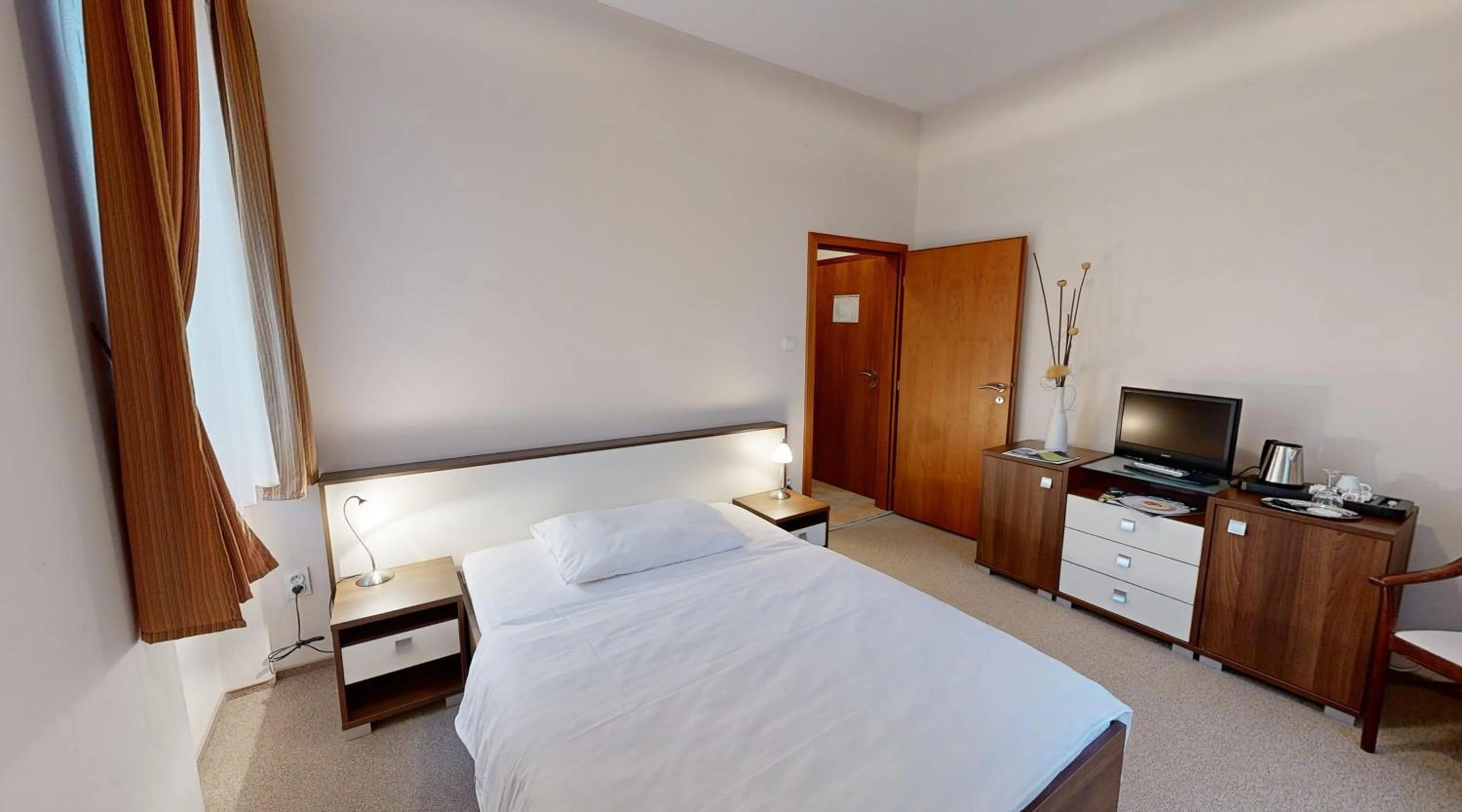 Photo of the whole room, Bed in Klaudia's Hotel & Restaurant at Golf Resort, Bač Šamorín