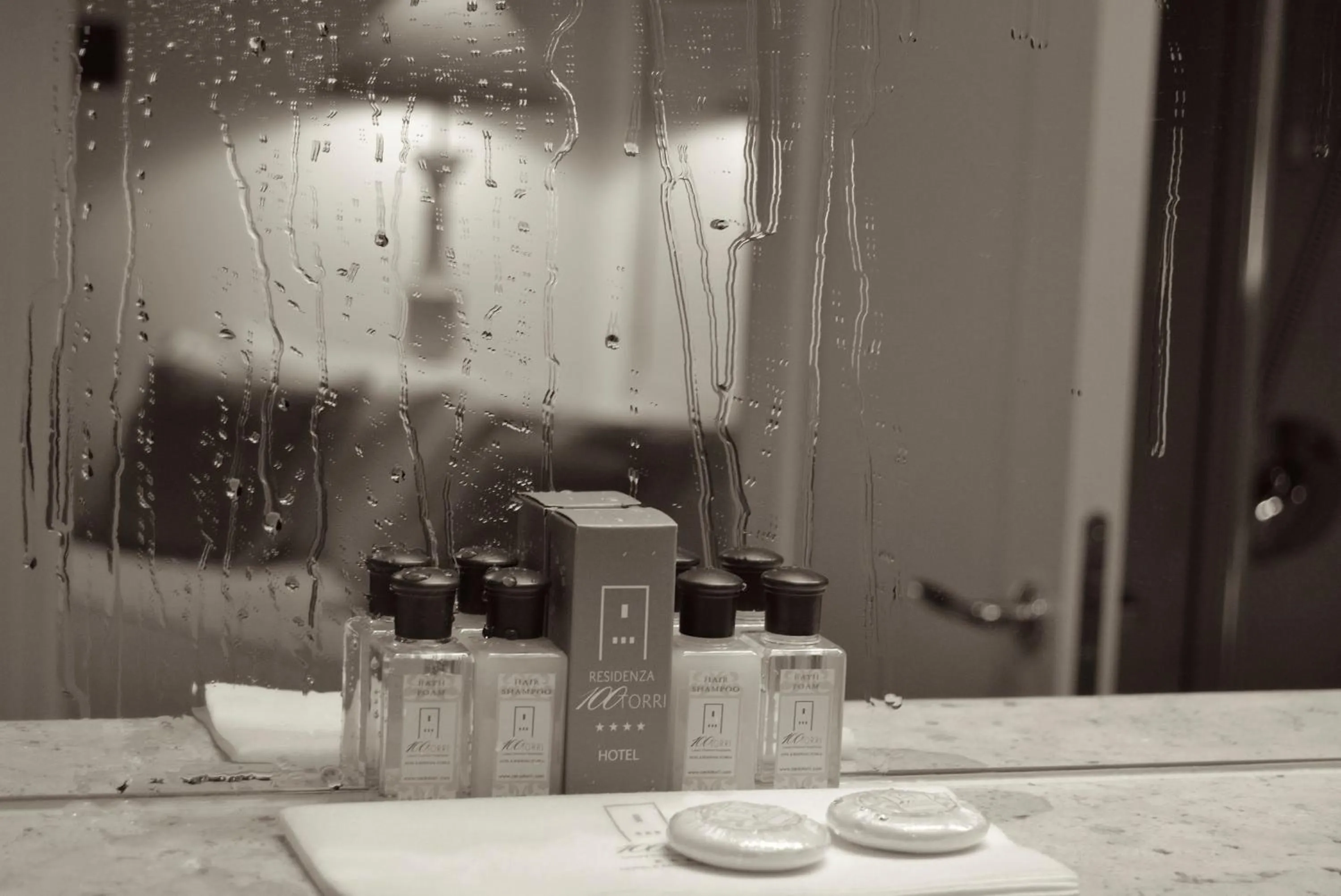 Property logo or sign in Hotel & Residenza 100 Torri