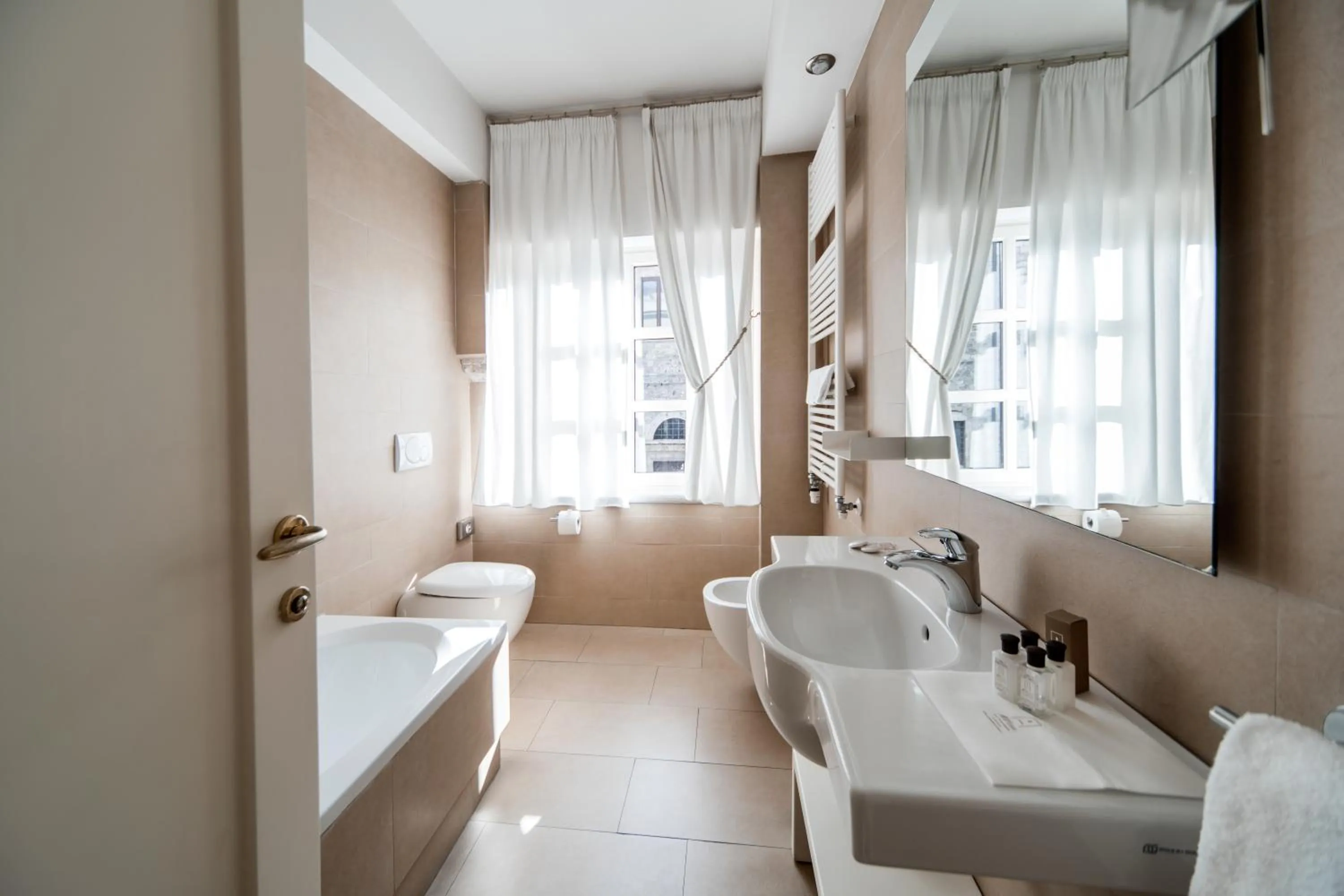 Shower in Hotel & Residenza 100 Torri