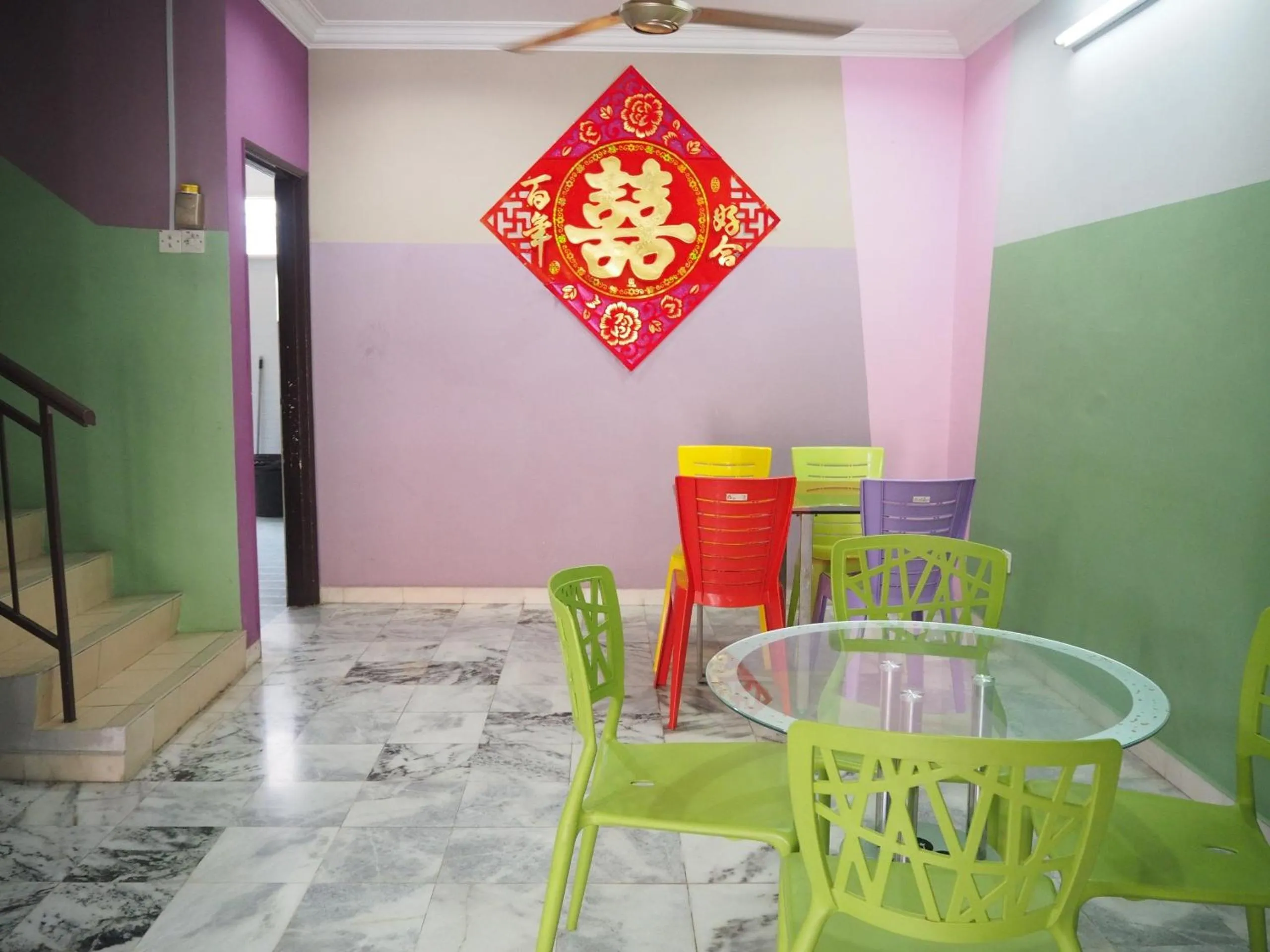Dining area in OYO Homes 90575 CK Bahau Homestay