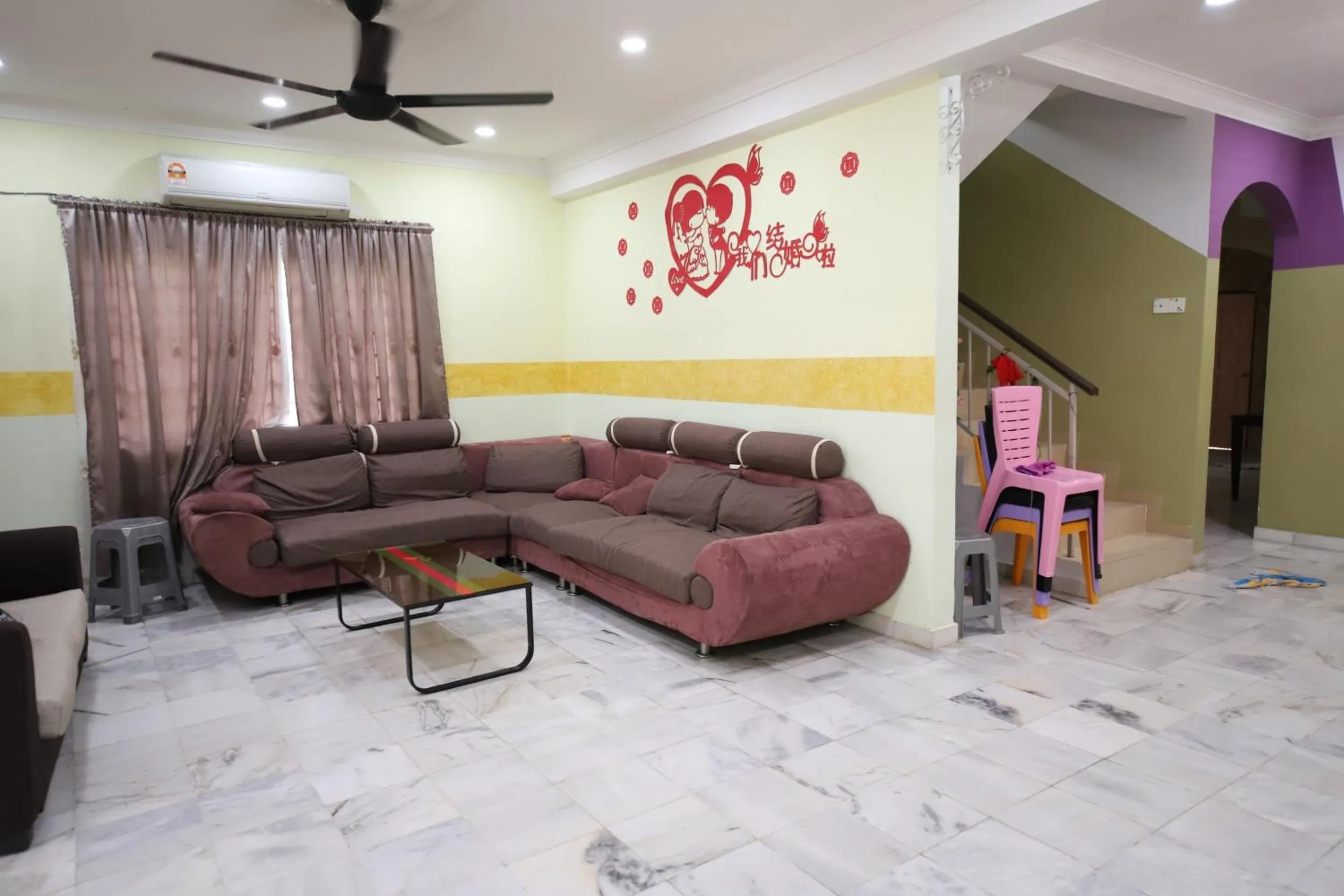 Living room in OYO Homes 90575 CK Bahau Homestay