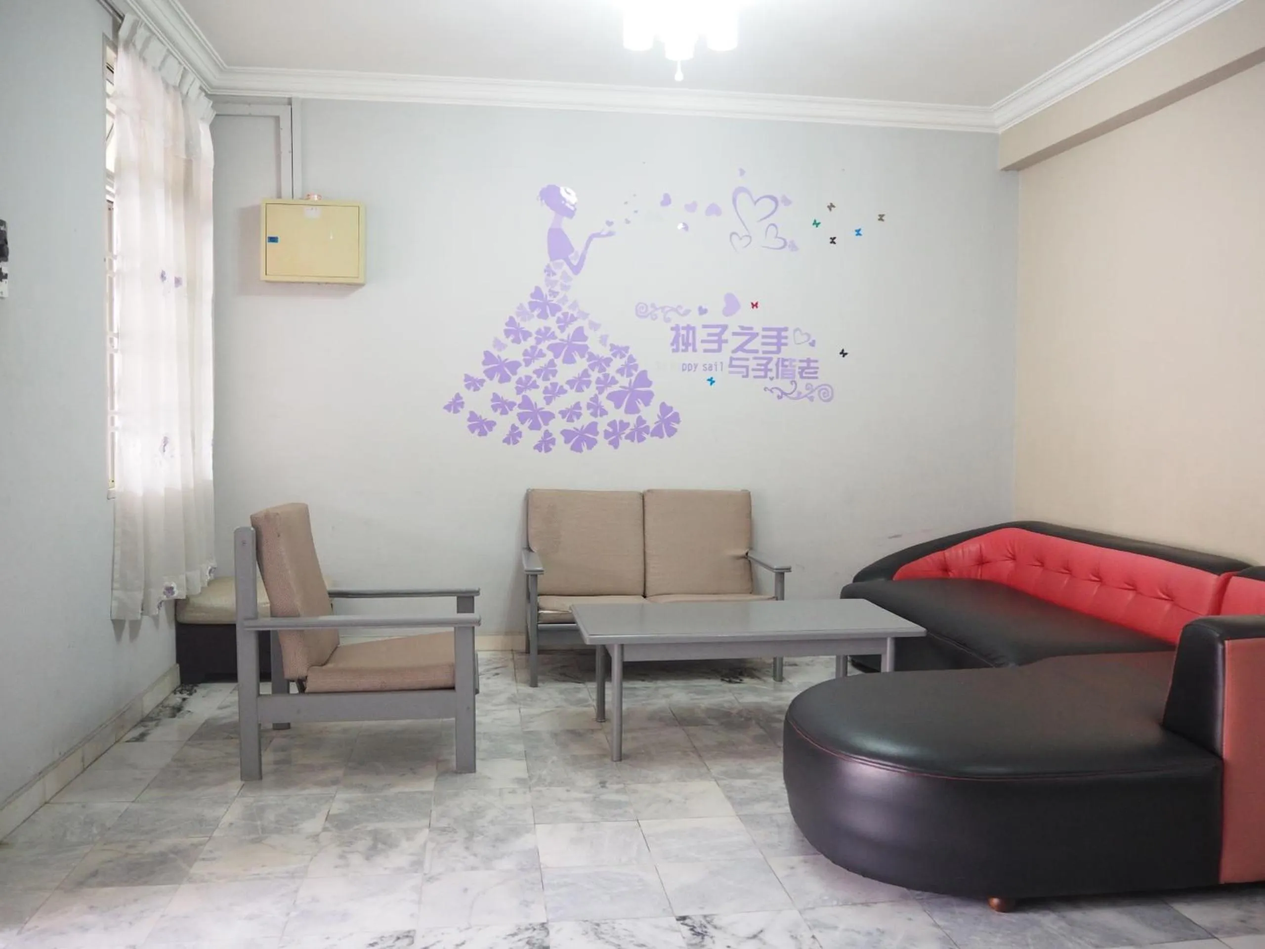 Living room in OYO Homes 90575 CK Bahau Homestay