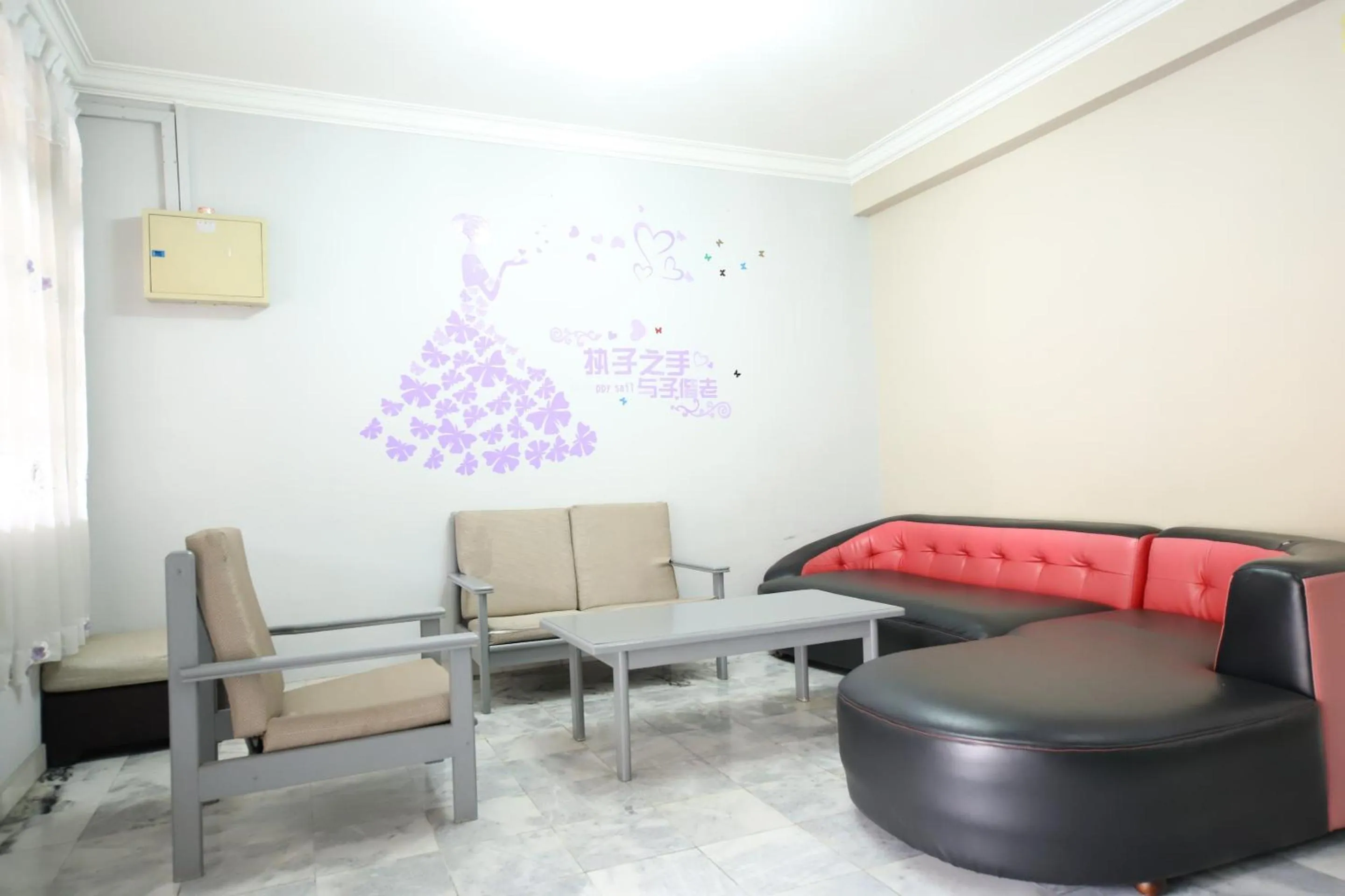 Living room in OYO Homes 90575 CK Bahau Homestay