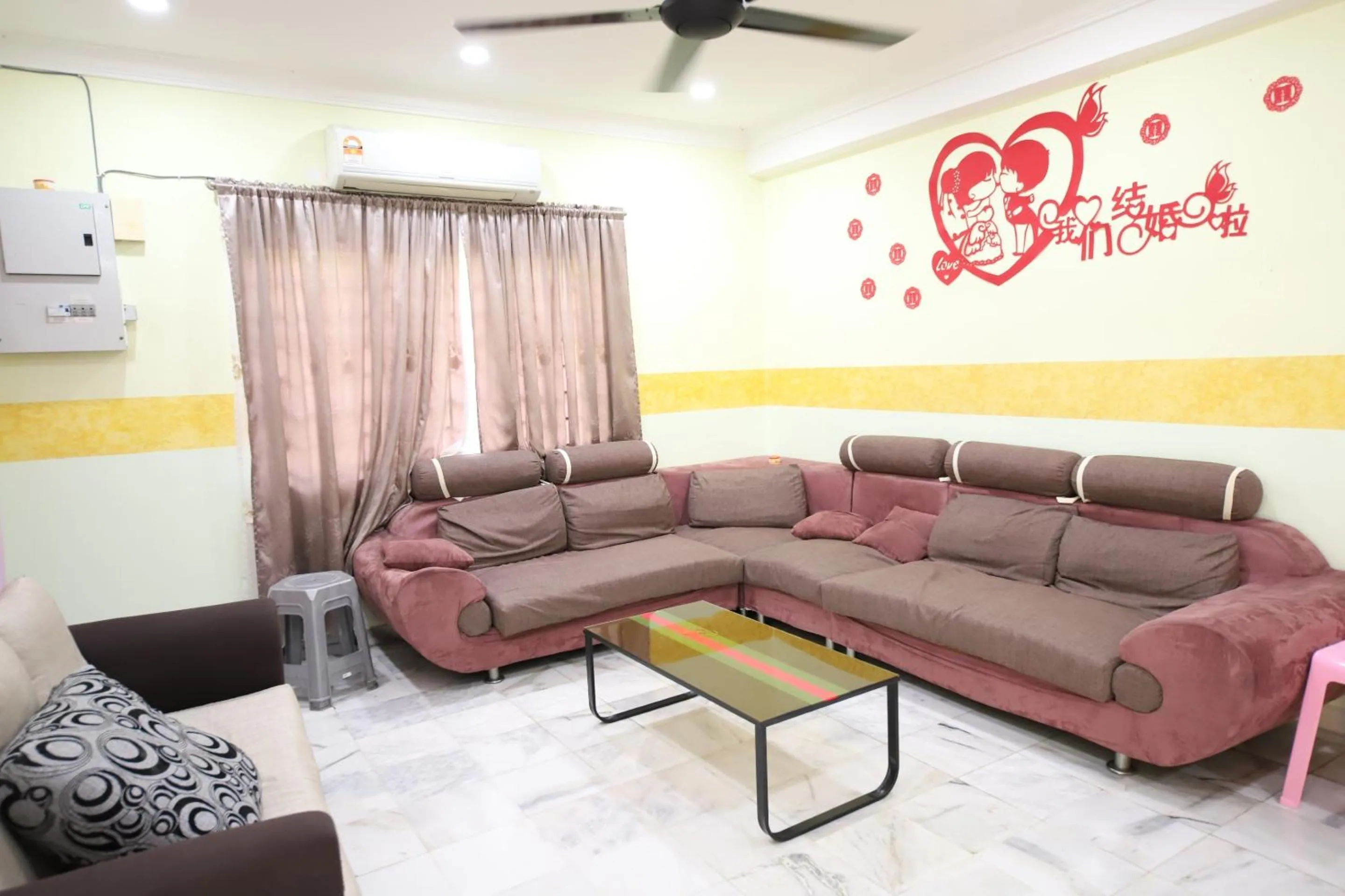 Living room in OYO Homes 90575 CK Bahau Homestay