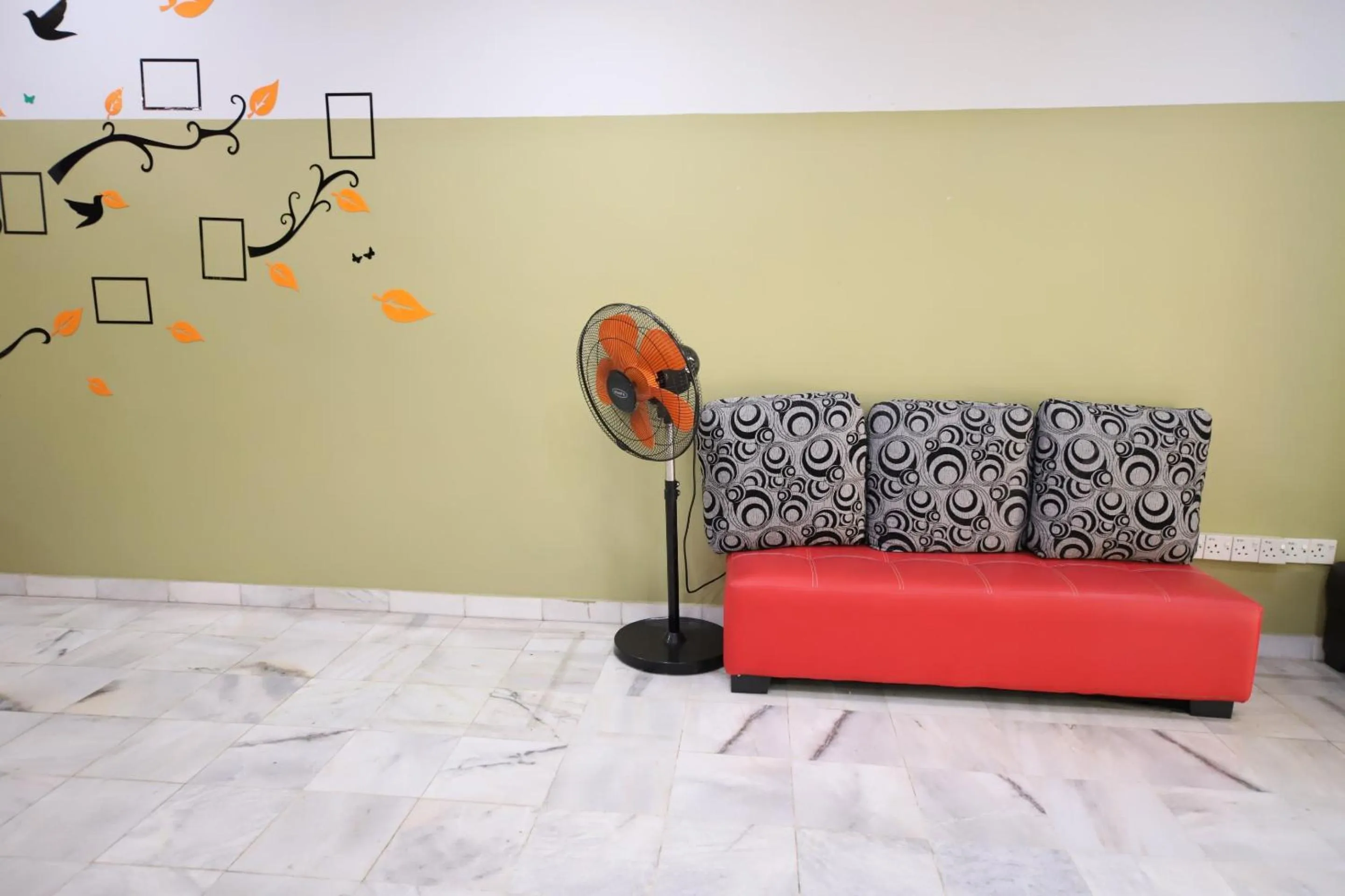 Living room in OYO Homes 90575 CK Bahau Homestay